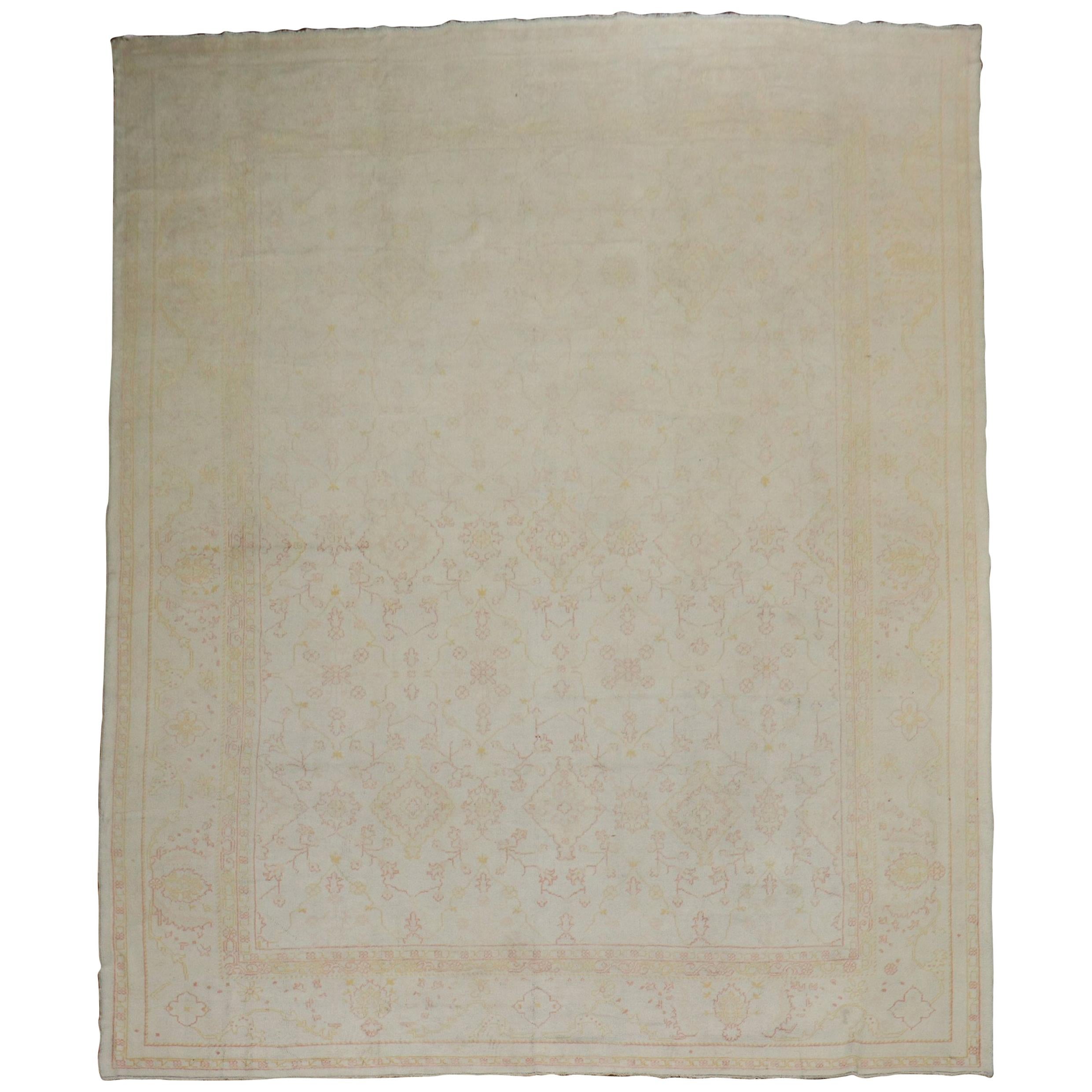 Feminine Pale Cream Antique Turkish Oushak Rug, 20th Century For Sale