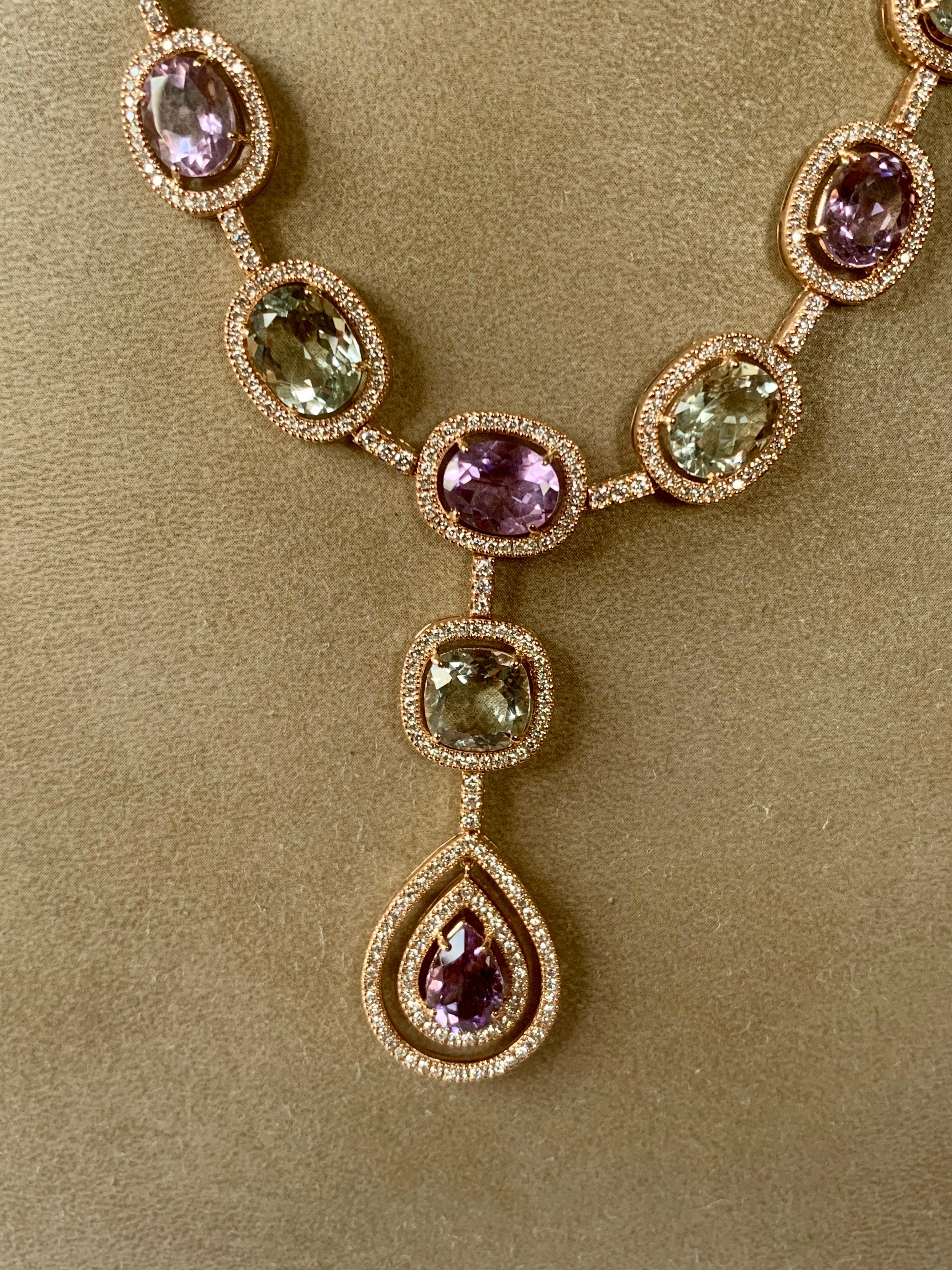 This playful yet romantic Diamond and (green) Amethyst necklace was inspired  in a Y necklace design and crafted in 18 K pink Gold. Set with 5 green Amethysts weighing 13.99 ct, 6 Amethysts weighing 13.05 ct and decorated with 443 brilliant cut
