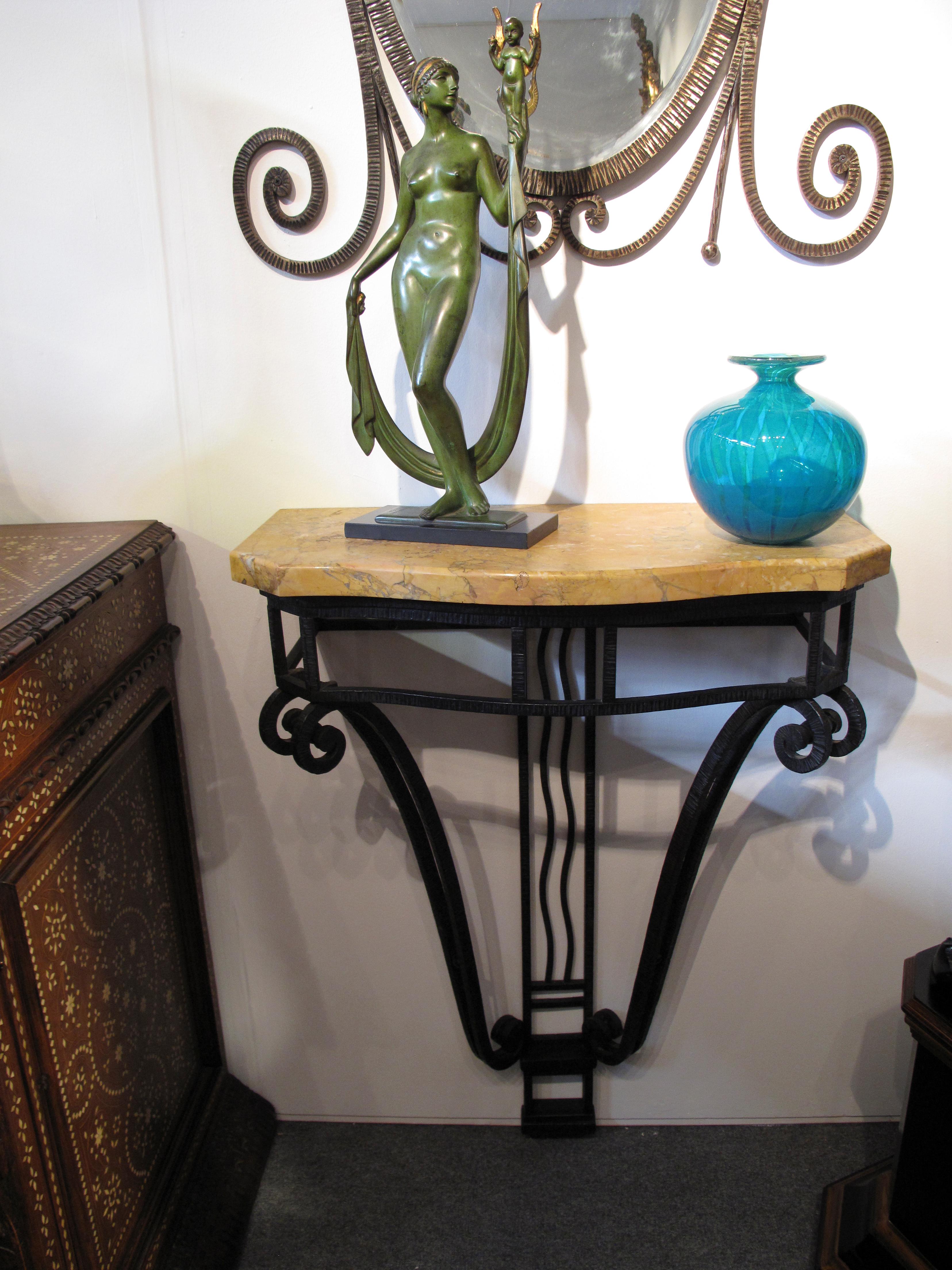 French Art Deco period wrought iron console table and mirror with sienna marble top.