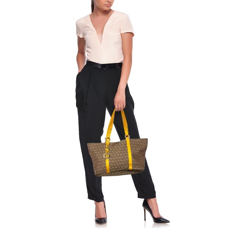 Timelessly elegant and stylish, Fendi's collections capture the effortless, nonchalant finesse of the modern woman. Crafted from leather and Zucchino canvas, this chic Superstar tote features a spacious interior with a top zip fastening. The sleek,