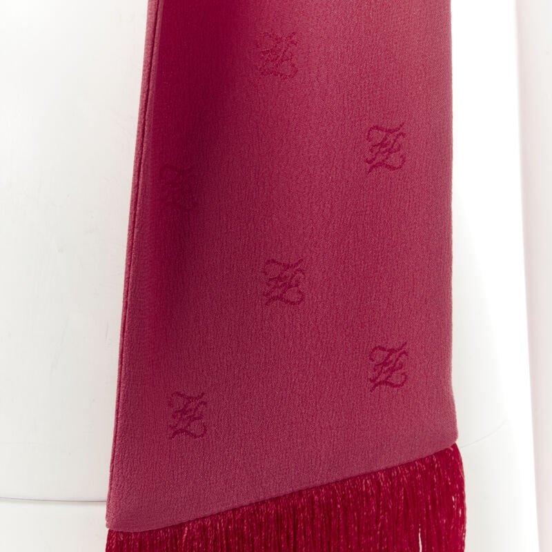 FENDI 100% silk FF monogram jacquard fringe extra long scarf
Reference: KNLM/A00212
Brand: Fendi
Material: 100% Silk
Color: Red
Pattern: Monogram
Made in: Italy

CONDITION:
Condition: Excellent, this item was pre-owned and is in excellent condition.