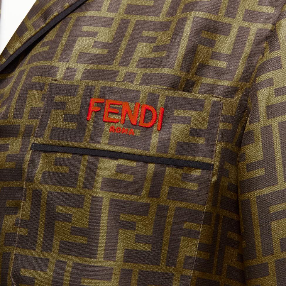 FENDI 100% silk twill FF Zucca monogram red embroidery pajama shirt IT38 XS
Reference: LNKO/A02348
Brand: Fendi
Material: Silk
Color: Brown, Red
Pattern: Monogram
Closure: Button
Extra Details: FENDI red embroidery at pocket.
Made in: