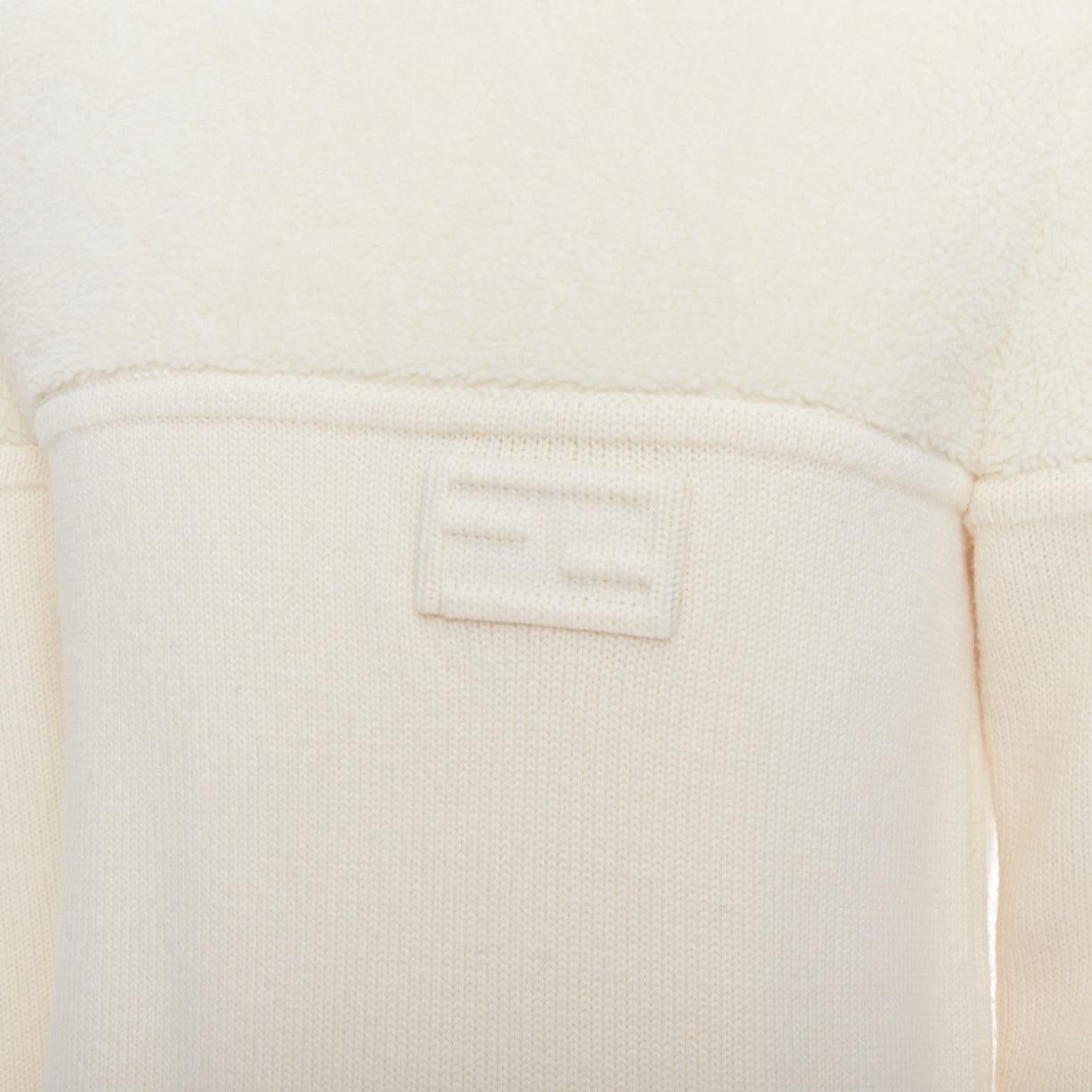 FENDI 100% wool fleece cream panelled logo applique sweater IT46 S
Reference: YIKK/A00124
Brand: Fendi
Material: Wool
Color: Cream
Pattern: Solid
Closure: Pullover
Extra Details: Fendi's sweater has been knitted in Italy from a luxurious wool and