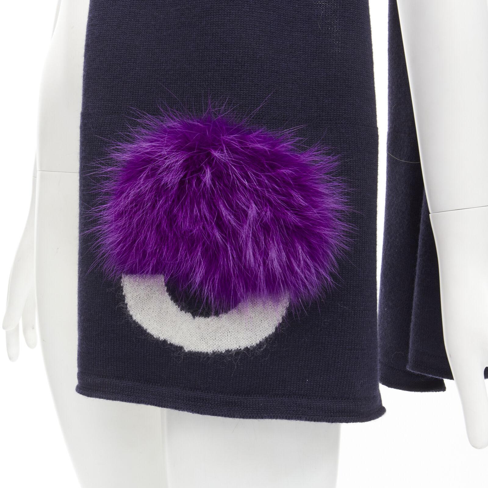 FENDI 100% wool navy blue Signature Monster Eyes purple fur trimmed scarf
Reference: ANWU/A00588
Brand: Fendi
Collection: Monster Bug
Material: Wool, Fur
Color: Navy, Purple
Pattern: Solid
Extra Details: Black signature monster eyes scarf with