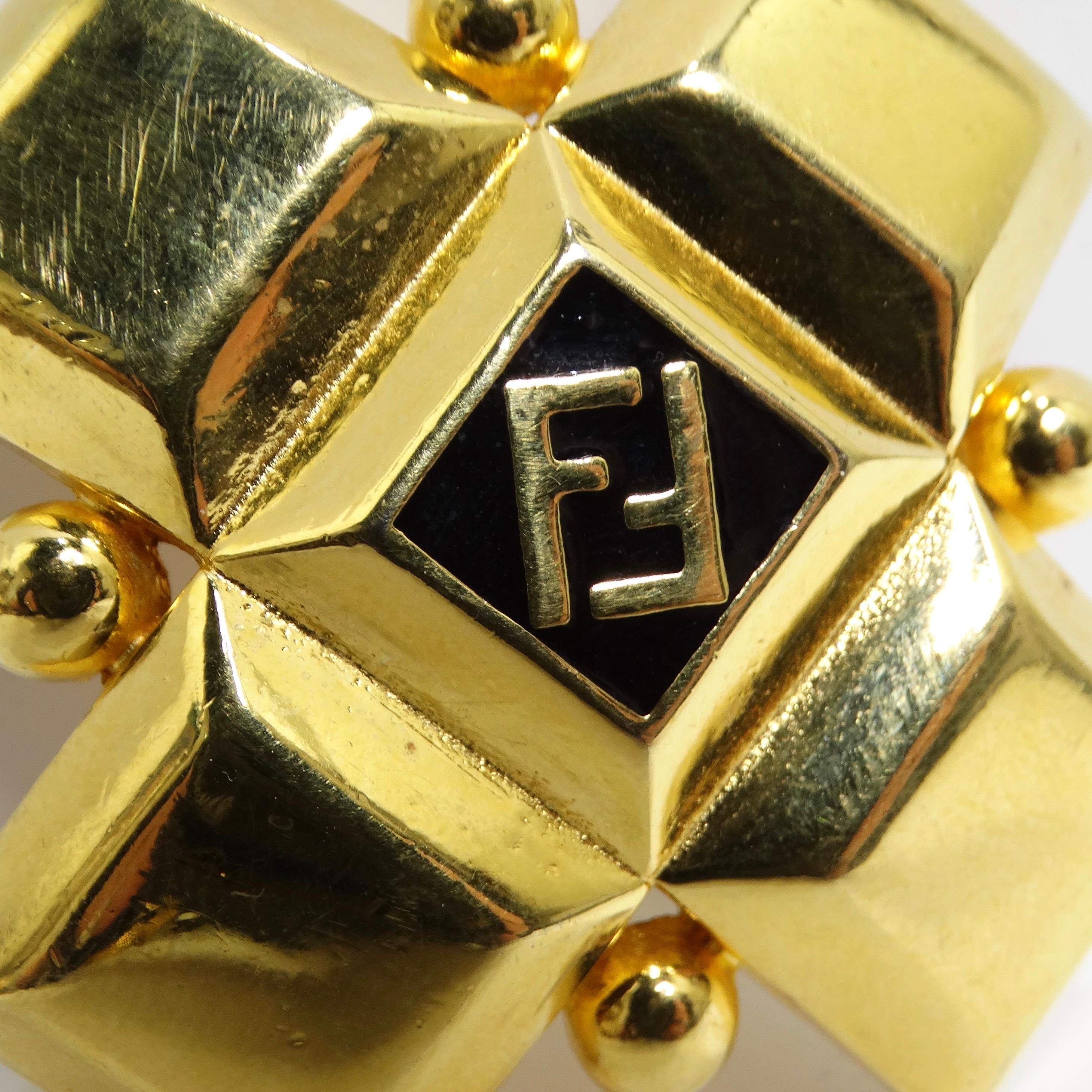Do not miss out on the Fendi 1980s Gold Plated FF Large Brooch—a stunning and bold statement piece that beautifully captures the essence of Fendi's iconic style. This brooch is not just an accessory; it's a wearable work of art, crafted from