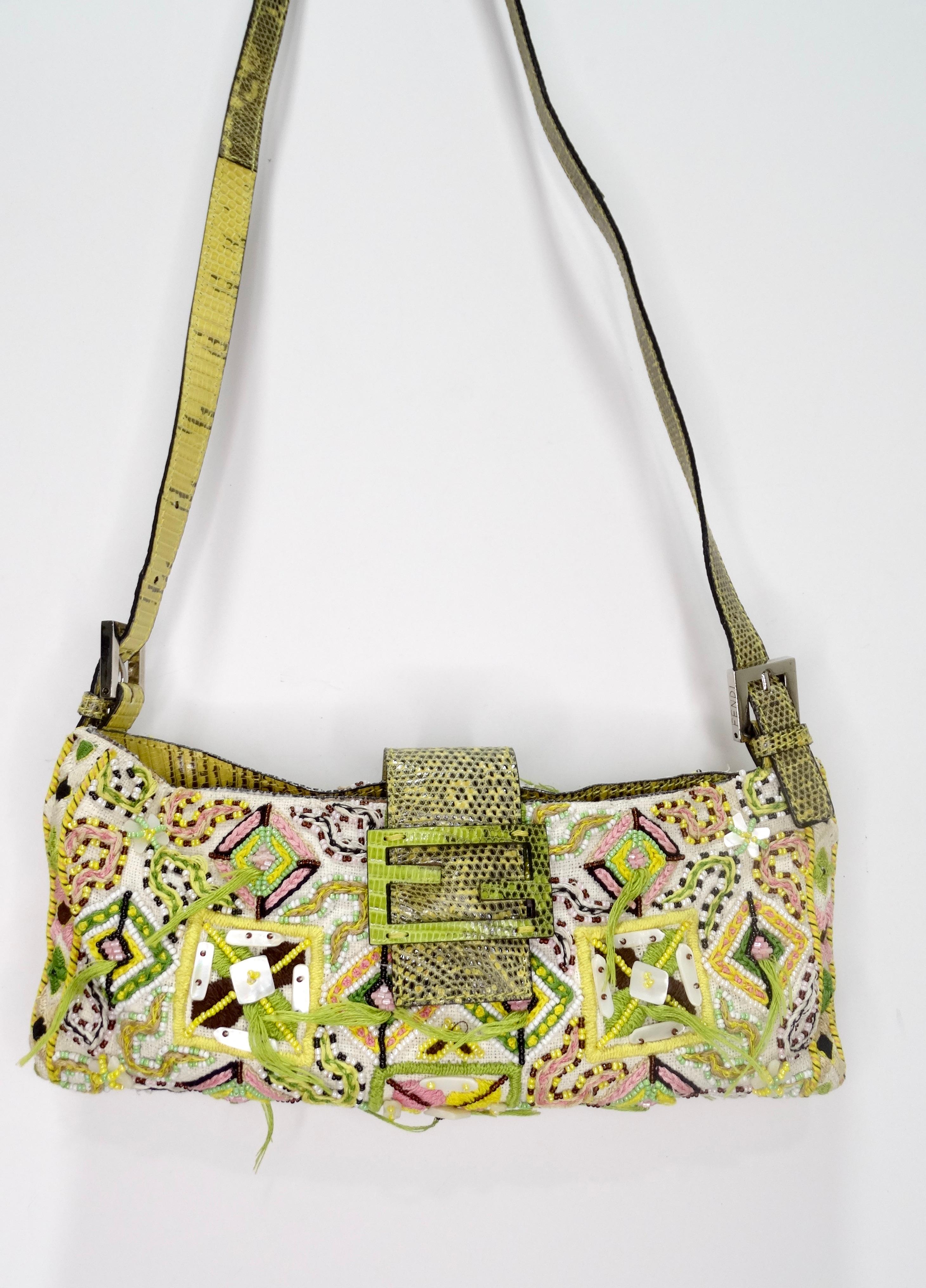 Make everyone green with envy with this adorable Fendi! Circa 1990s, this Fendi baguette features bohemian embroidery with colorful beading and Mother of Pearl flakes throughout. Includes a lime green/yellow python adjustable strap and the front