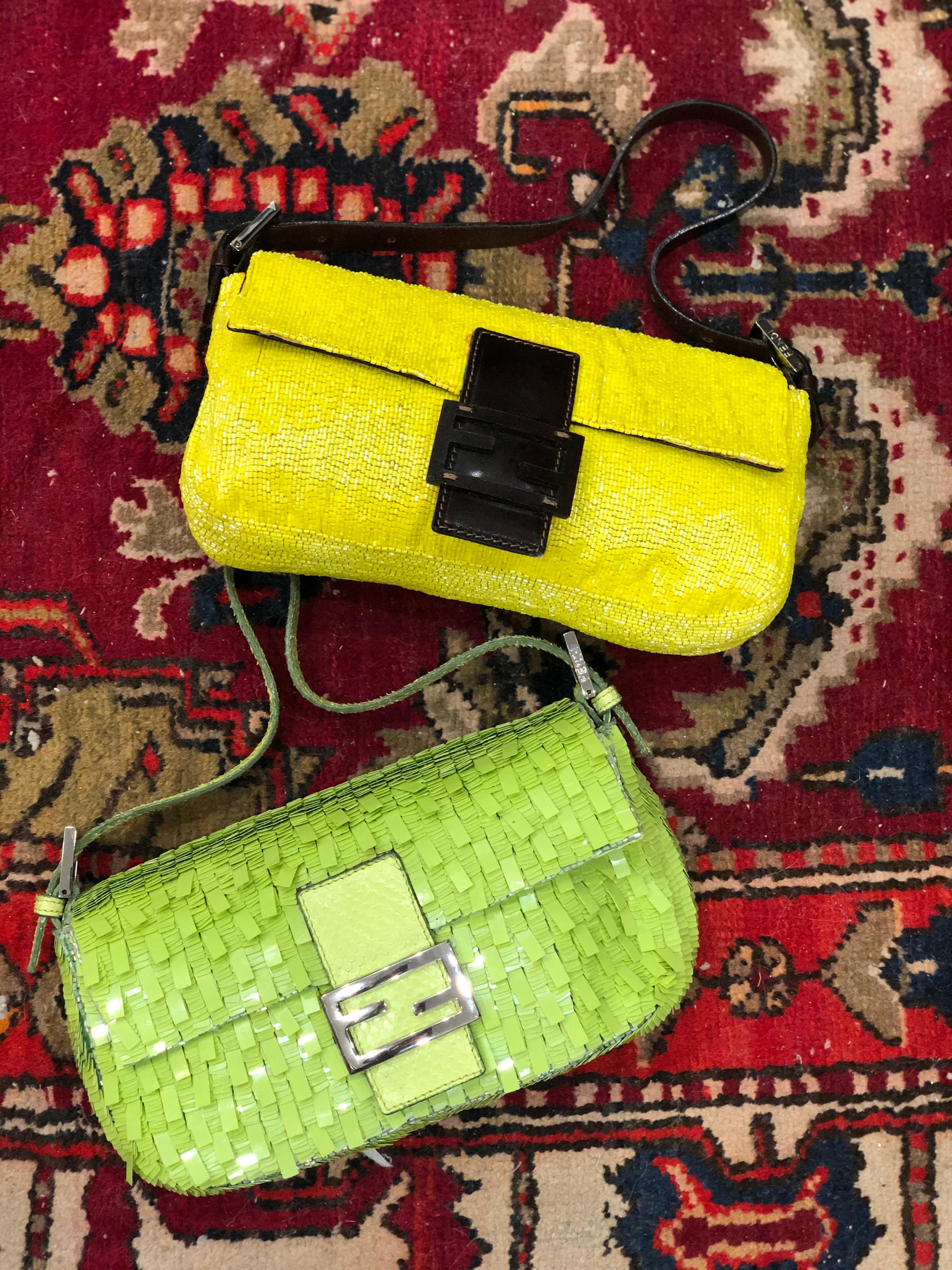 Make everyone green with envy with this adorable Fendi! Circa 1990s, this Fendi baguette is embellished with flashy lime green sequins and features a beaded trim, a lime green python adjustable strap and the front flap has a flat tonal python belt