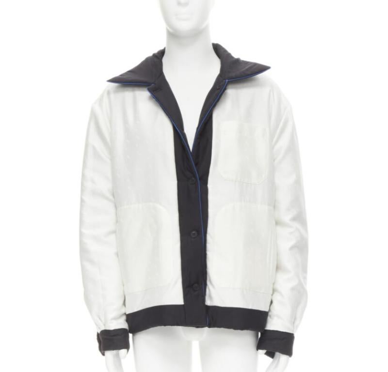 FENDI 2021 Veste réversible 100% soie noire blanche avec logo IT48 M
Référence : TGAS/C00730
Marque : Fendi
Modèle : FW1061 AGZ2 F0QA1
MATERIAL : 100% soie
Couleur : Noir, Whiting
Motif : Solide
Fermeture : bouton
Doublure :  Soie
Détails