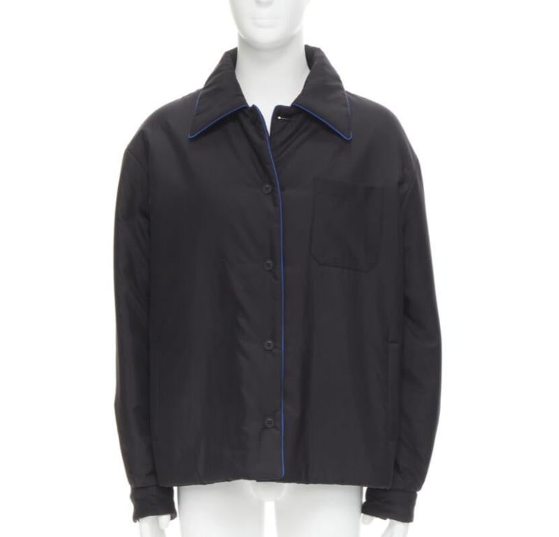 FENDI 2021 Reversible 100% silk black white logo padded jacket IT52 XL
Reference: TGAS/C00743
Brand: Fendi
Model: FW1061 AGZ2 F0QA1
Material: 100% Silk
Color: Black, White
Pattern: Solid
Closure: Button
Lining:  Silk
Extra Details: Reversible padded