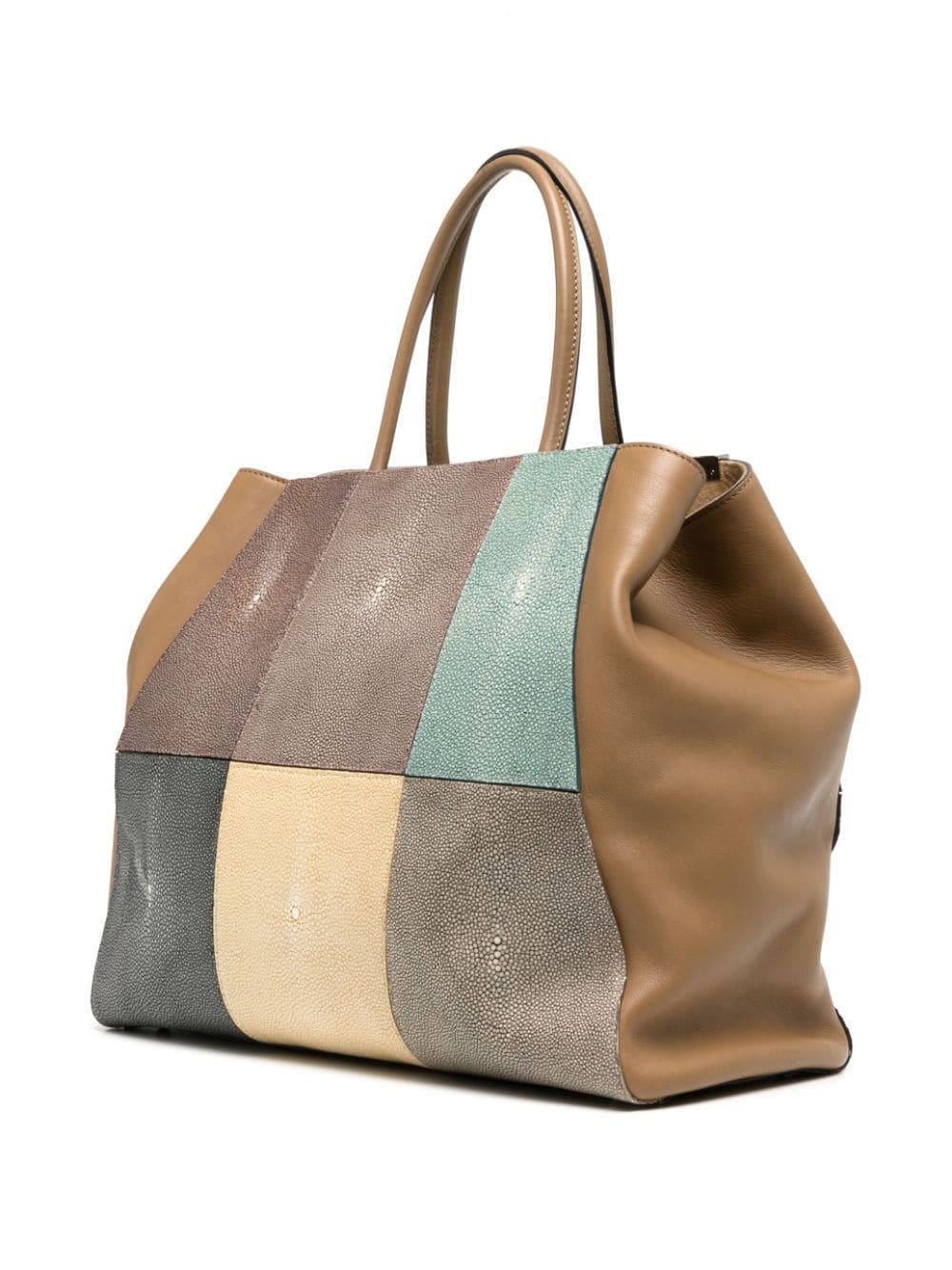 Rectangular body Fendi Tote bag expertly crafted in Italy with 100% leather in camel brown and multicolour with a patchwork design made of leather patchwork. Featuring two rolled top handles, magnetic fastening and an internal zip-fastening pocket.