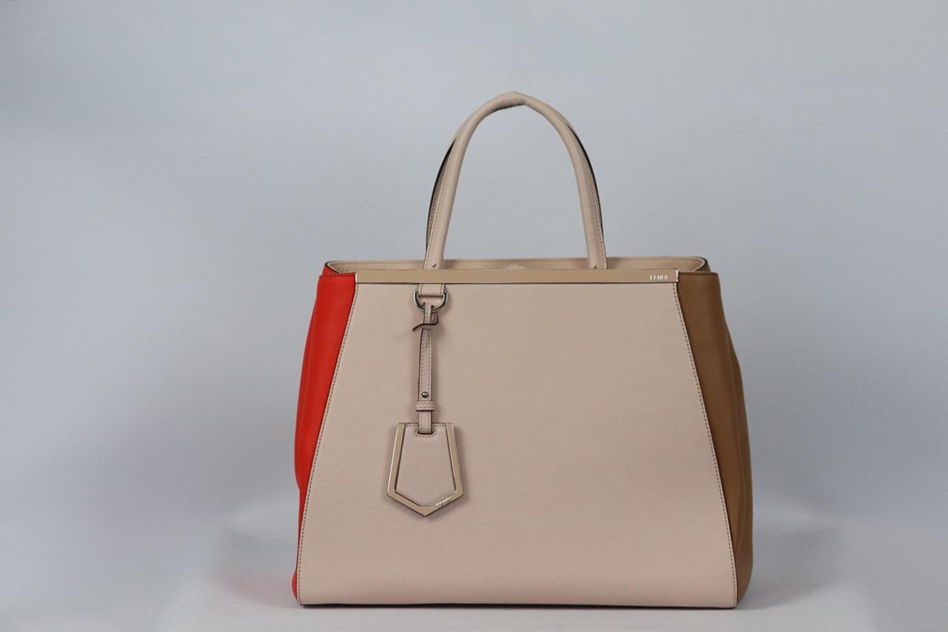 Fendi 2Jours medium textured leather tote bag. Pink, orange and brown. Snap button at top. Does not come with dustbag or box. Height: 11 in. Width: 13.9 in. Depth: 6.5 in. Handle Drop: 5.2 in. Strap Drop: 13 in. Good condition - Some cracking and
