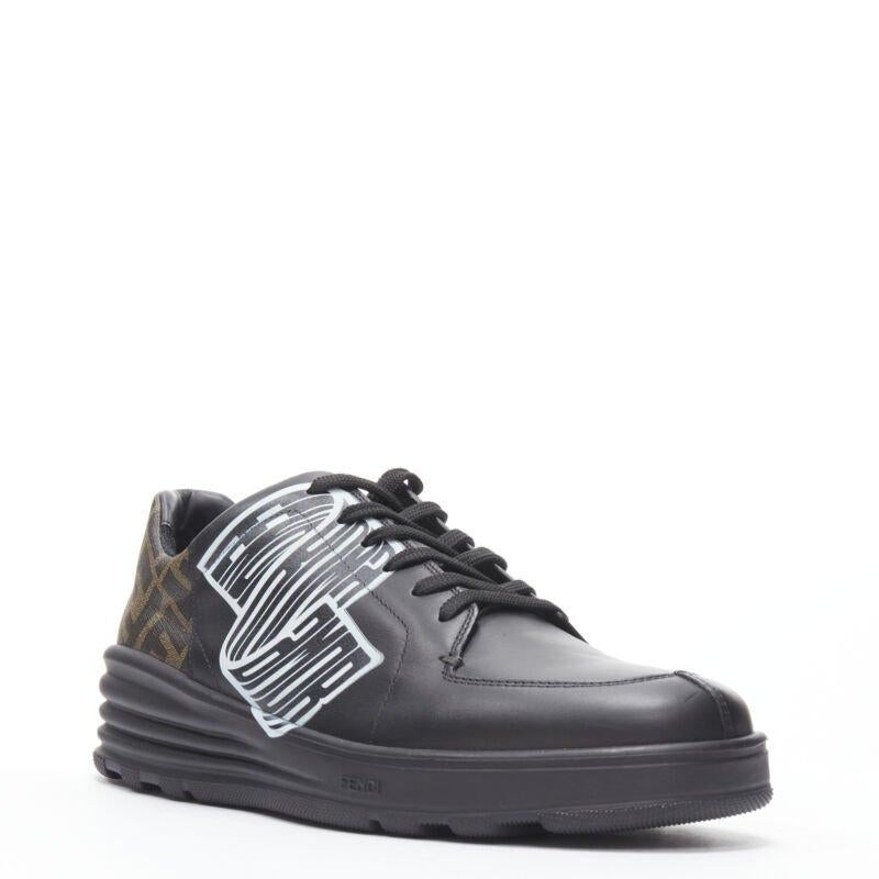 FENDI Amor Roma black leather print Zucca FF monogram heel sneakers UK8 EU42
Reference: TGAS/B01606
Brand: Fendi
Model: Amor Roma black sneakers
Material: Leather
Color: Black, Brown
Pattern: Solid
Closure: Lace Up
Extra Details: Graphic print on