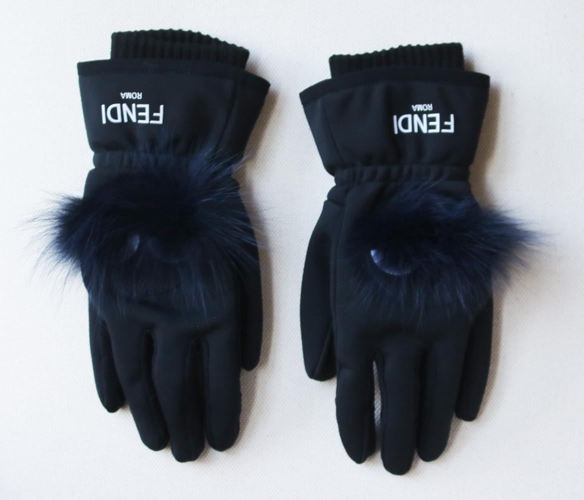 Fendi - Whether intended for on the slopes or off, add personality to your accessories with these Fendi gloves. Insulated to keep hands cozy against cold weather, the pair are accented with the Italian design house's now-ubiquitous bug eyes appliqué