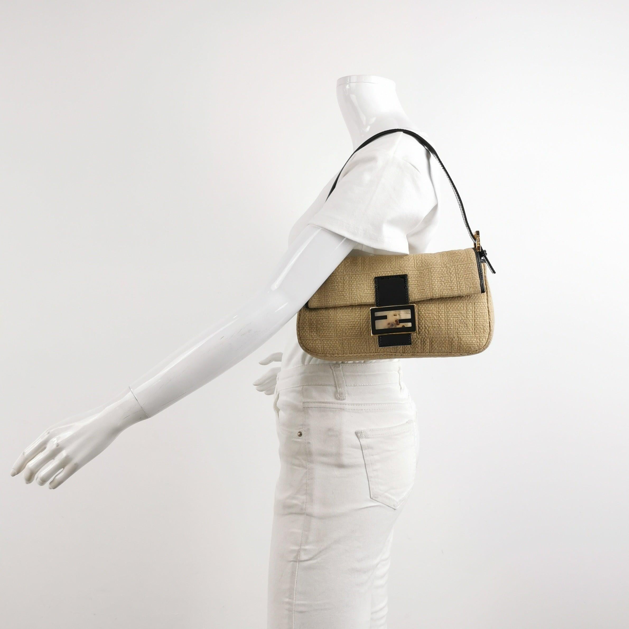 Fendi Baguette 1997 Beige Canvas Zucca Embossed with Zucca Interior
 These are professional photos of the actual bag.
 Introducing the Fendi Baguette 1997, a reissue of a classic icon featuring the beloved Zucca print embossed on the exterior canvas
