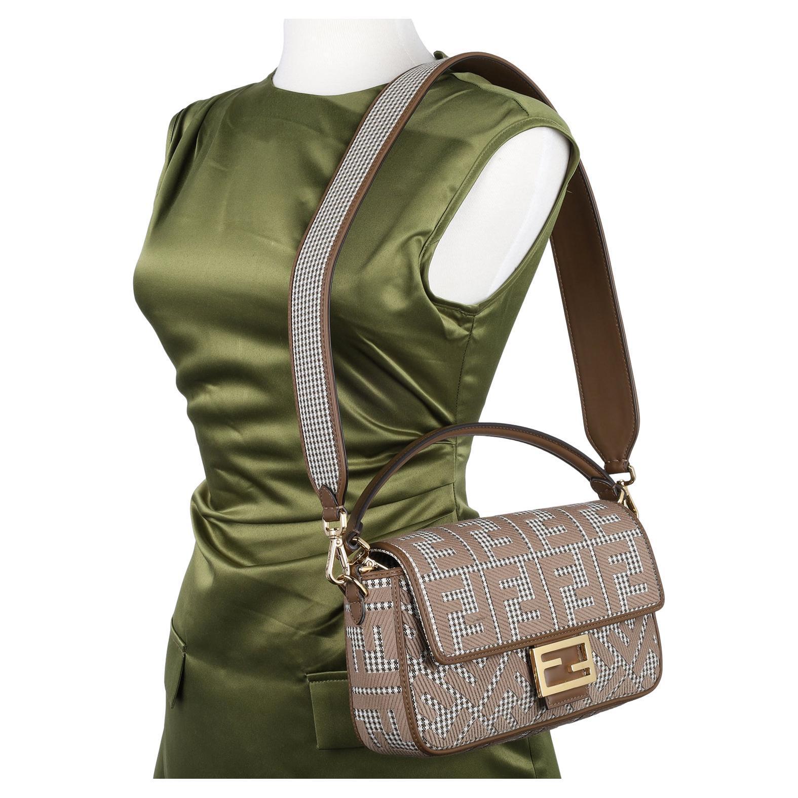 Authentic, pre-owned Like New Fendi Baguette Shoulder Bag. Features Zucca houndstooth wool with leather trim, top handle, shoulder strap, front flap closure, front of bag Fendi logo, large interior with slip pocket, gold-tone hardware.  

Made in