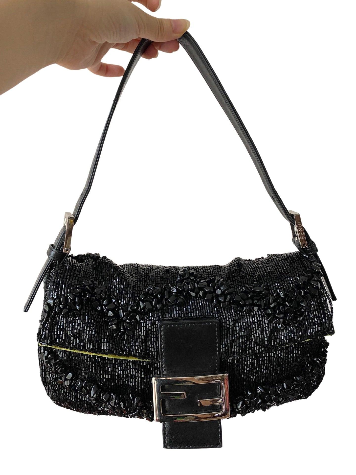 Fendi Baguette Black Beaded Shoulder Bag with Stones in Wave Pattern
 These are professional photos of the actual bag offered by Luxbags.
 Featured in the Fendi Baguette book, this exquisite Fendi Baguette Black Beaded with Stones in Wave Pattern is