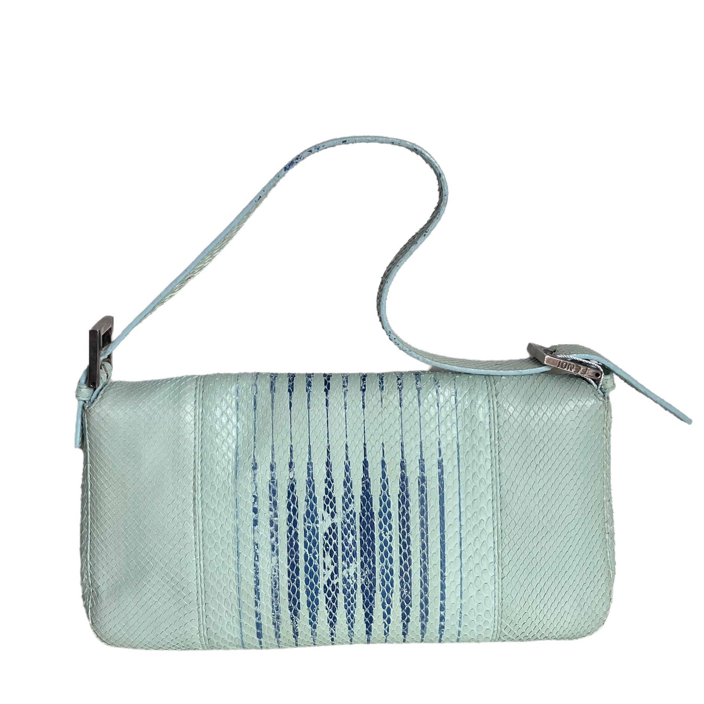 Fendi Baguette Blue Teal Python-skin Leather Shoulder Bag These are professional photos of the actual bag offered by Luxbags. CONDITION: VERY GOOD This vintage Fendi baguette is in very good condition. Some discoloration on the bag. DETAILS Fendi
