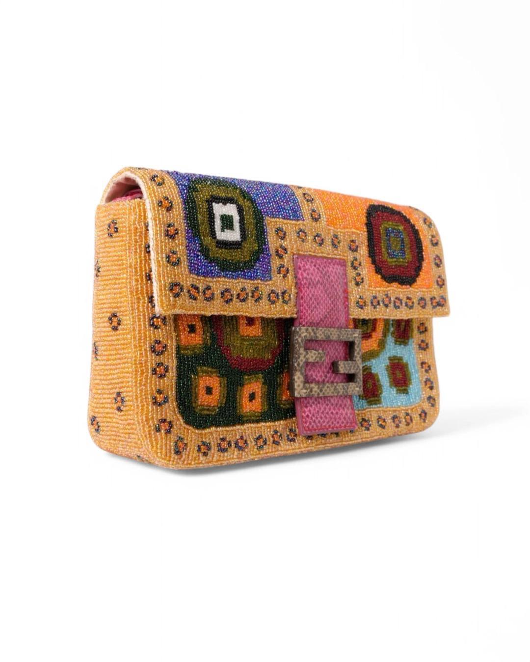 Fendi Ethical Baguette model bag, made of multicolor embroidered beads with elegant lizard skin inserts and silver hardware details. It features a front flap with the classic 