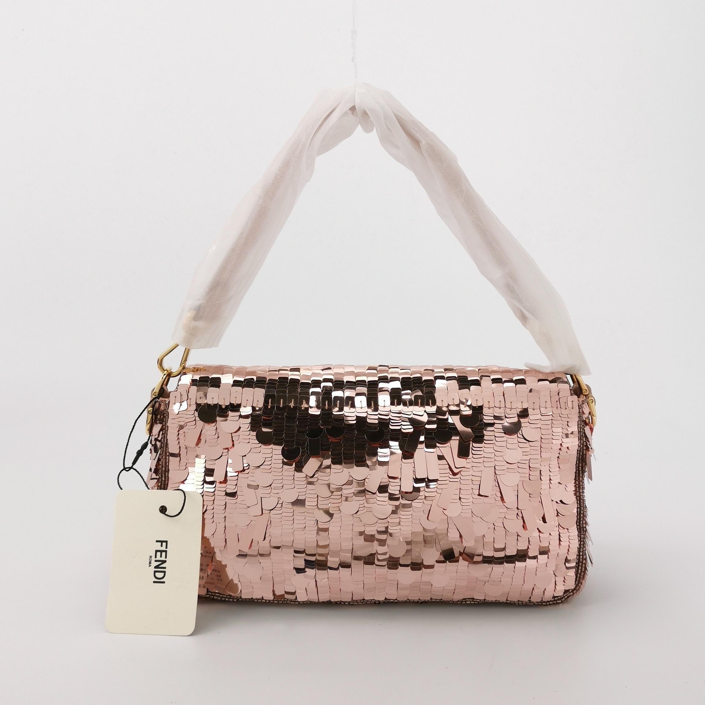 Fendi Baguette Glitter Sequins Paillettes Vitello Grace Sex and the City Baby Pink
 These are professional photos of the actual bag.
 This is an authentic Fendi baguette decorated in baby pink sequins. Made famous by the drama Sex and the City, this