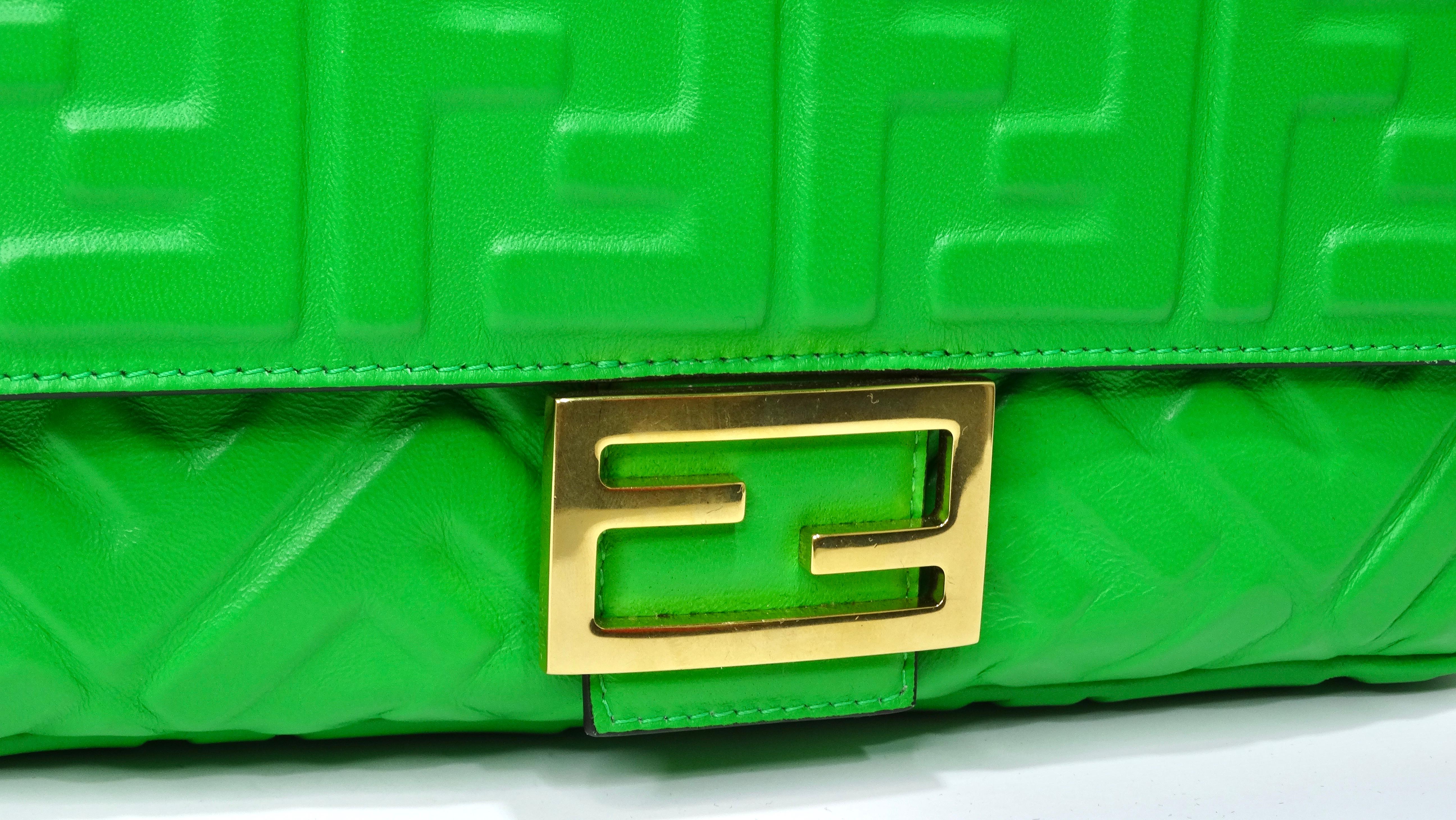 A beautiful piece to say the least! Everyone needs a green bag in their collection, this is your sign! This is an authentic FENDI Nappa FF Embossed Baguette in green. This chic and iconic baguette is crafted of Fendi monogram-embossed lambskin