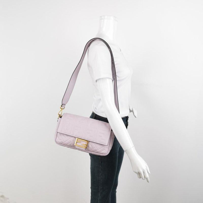 Fendi Baguette Lambskin Leather Crossbody Bag Medium Lavender
These are professional photos of the actual bag offered by Luxbags.
Experience luxury and style with the Fendi Baguette in luxuriously Nappa Leather Crossbody Bag. Crafted from soft nappa