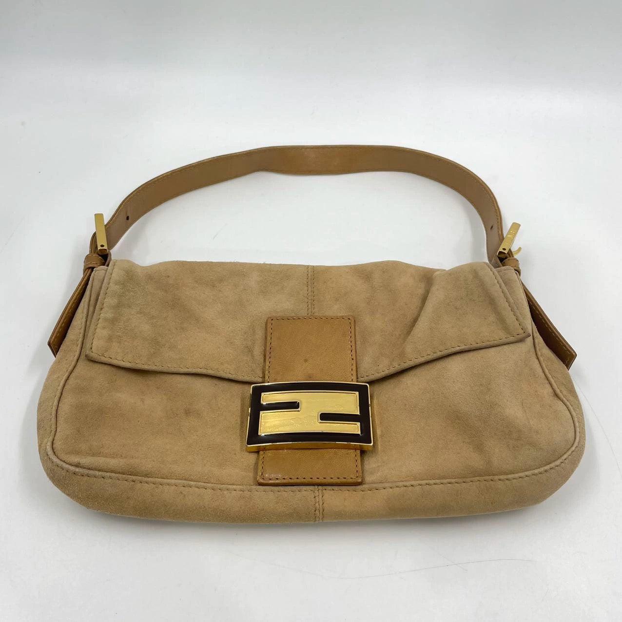 Fendi Baguette Light Camel Brown Suede Leather Shoulder Bag
 These are professional photos of the actual bag.
 EXCELLENT: VERY GOOD
 Rubbing along the corners, edges and strap. 
 DETAILS
 
 
 Model: Fendi Baguette
 
 
 Size: Medium
 
 
 Exterior
