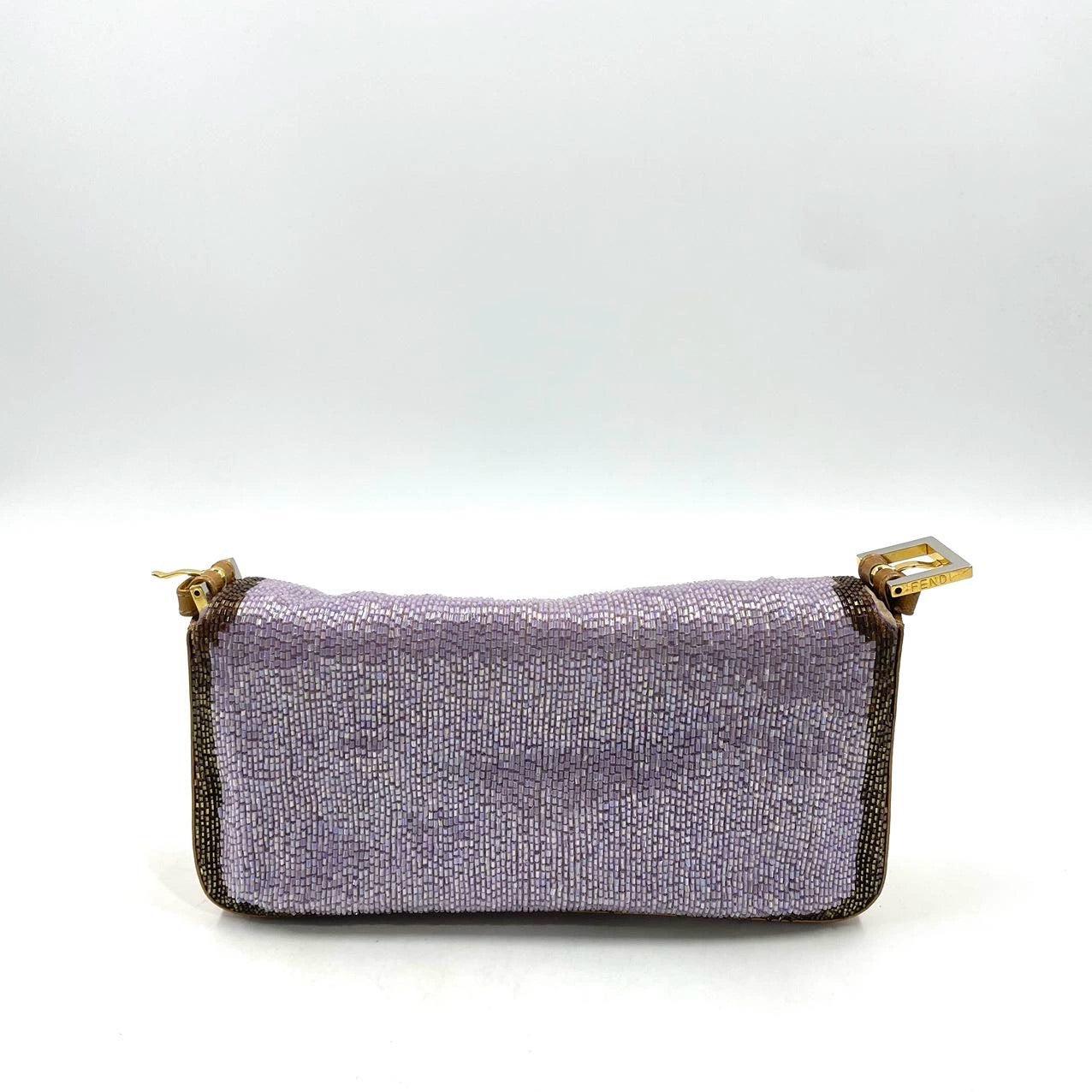 FENDI Baguette Lilac Purple Glitter beads and Gold Leather
  These are professional photos of the actual bag.
  CONDITION : VERY GOOD
  This preloved item is in very good condition with signs of use. There may be a couple of missing beads here and