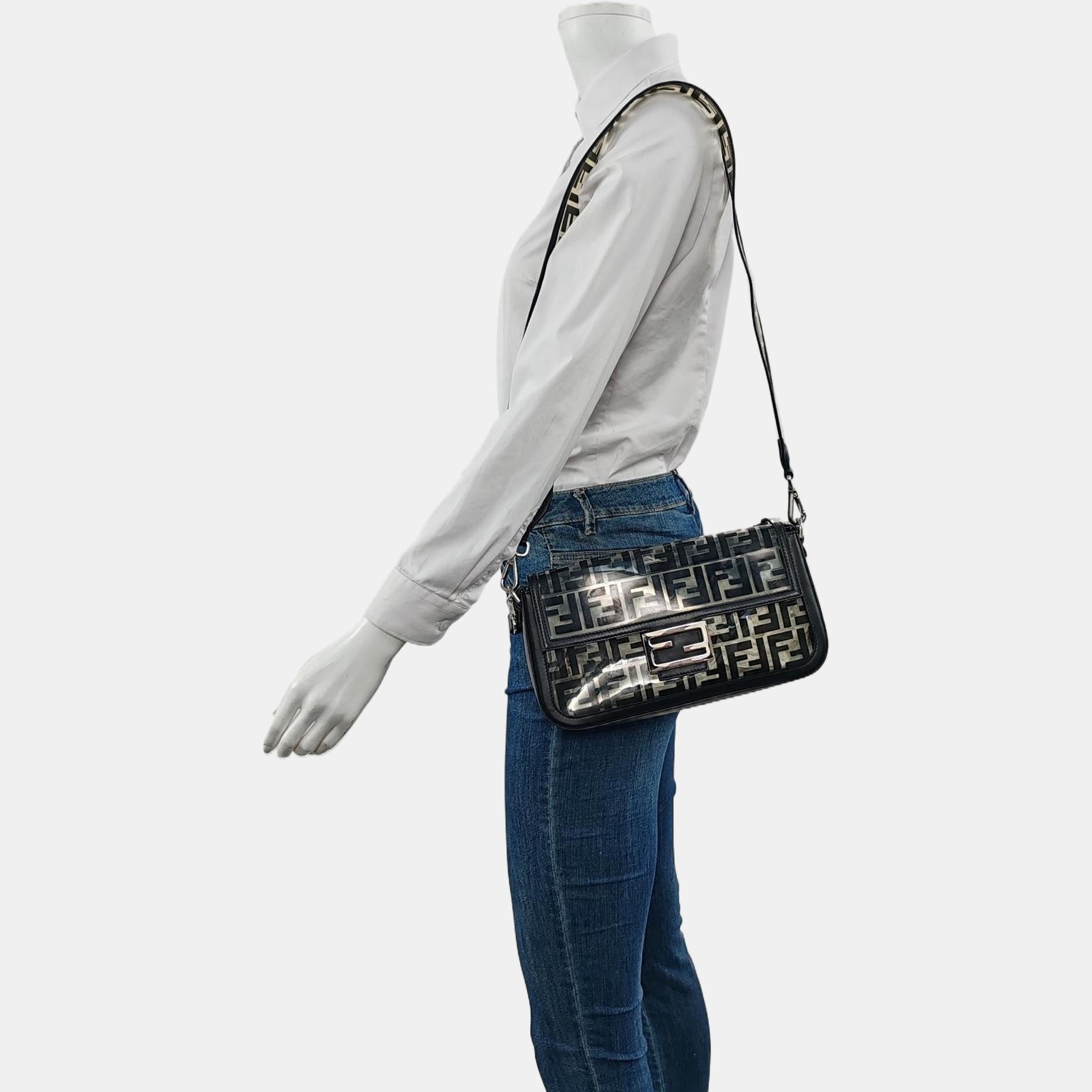 Fendi Baguette Medium Transparent PVC Black Zucca Crossbody Bag
These are professional photos of the actual bag offered by Luxbags.
CONDITION : VERY GOOD
Light signs of use including light stains on the exterior and interior. Scratches to the