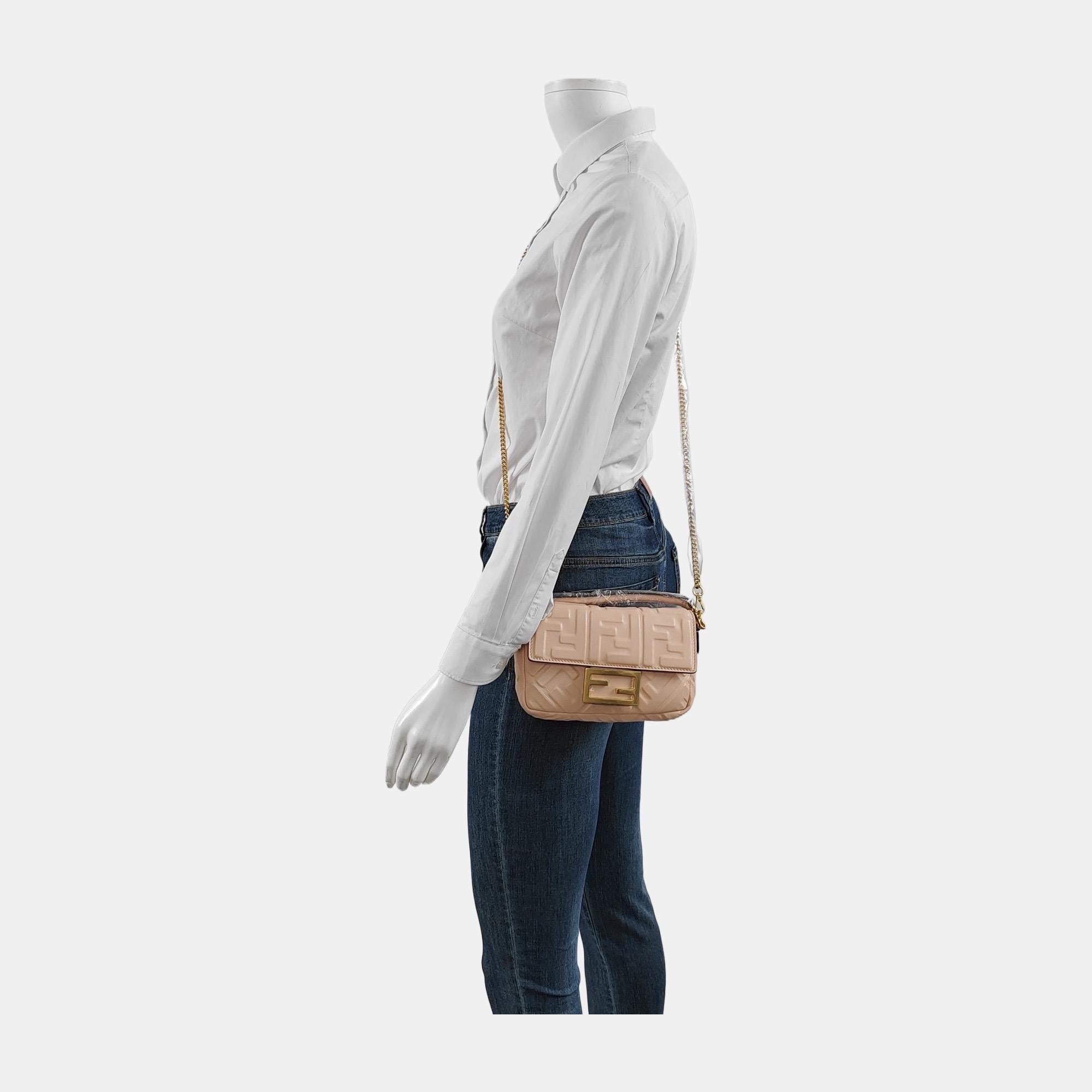 Fendi Baguette Mini Black Nappa Leather Crossbody Bag These are professional photos of the actual bag offered by Luxbags. Experience luxury and style with the Fendi Baguette Mini Nappa Leather Crossbody Bag. Crafted from soft nappa leather with
