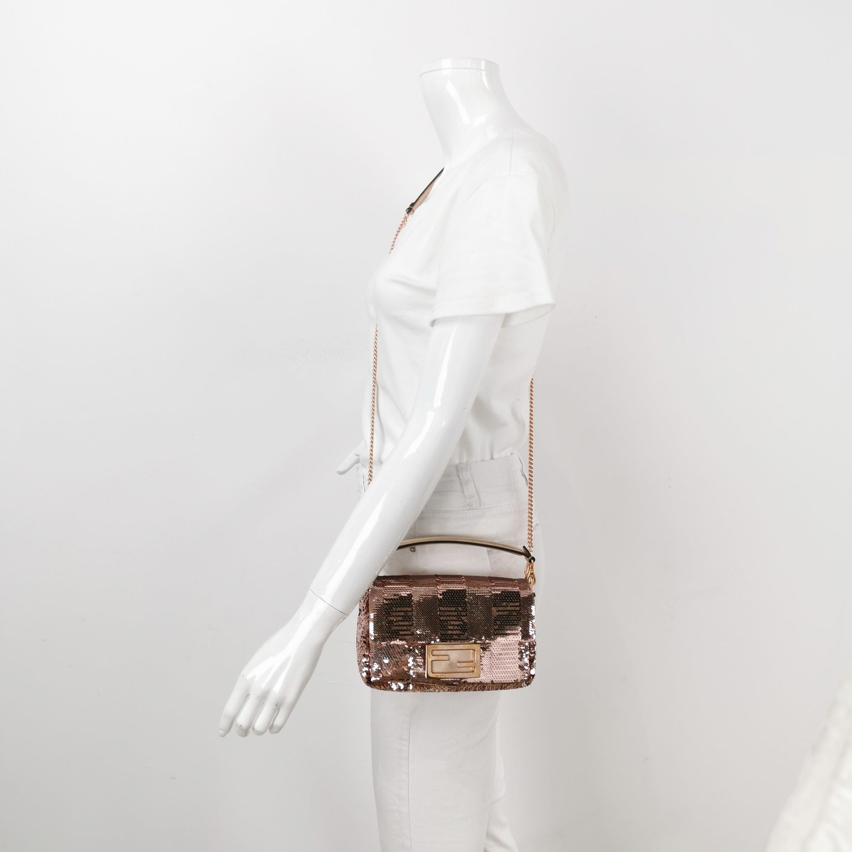 Fendi Baguette Mini Pink Glitter Sequins Valentine's Special Crossbody Bag
 These are professional photos of the actual bag.
 CONDITION: MINT
 This preloved item is in mint condition with minimal signs of use. Light scratches to the hardware, and