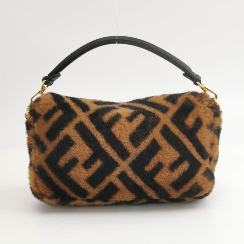 Fendi Baguette Mini Shearling Vitello Dolce Marco FF 1974 Tobacco Brown Zucca In Excellent Condition For Sale In AUBERVILLIERS, FR