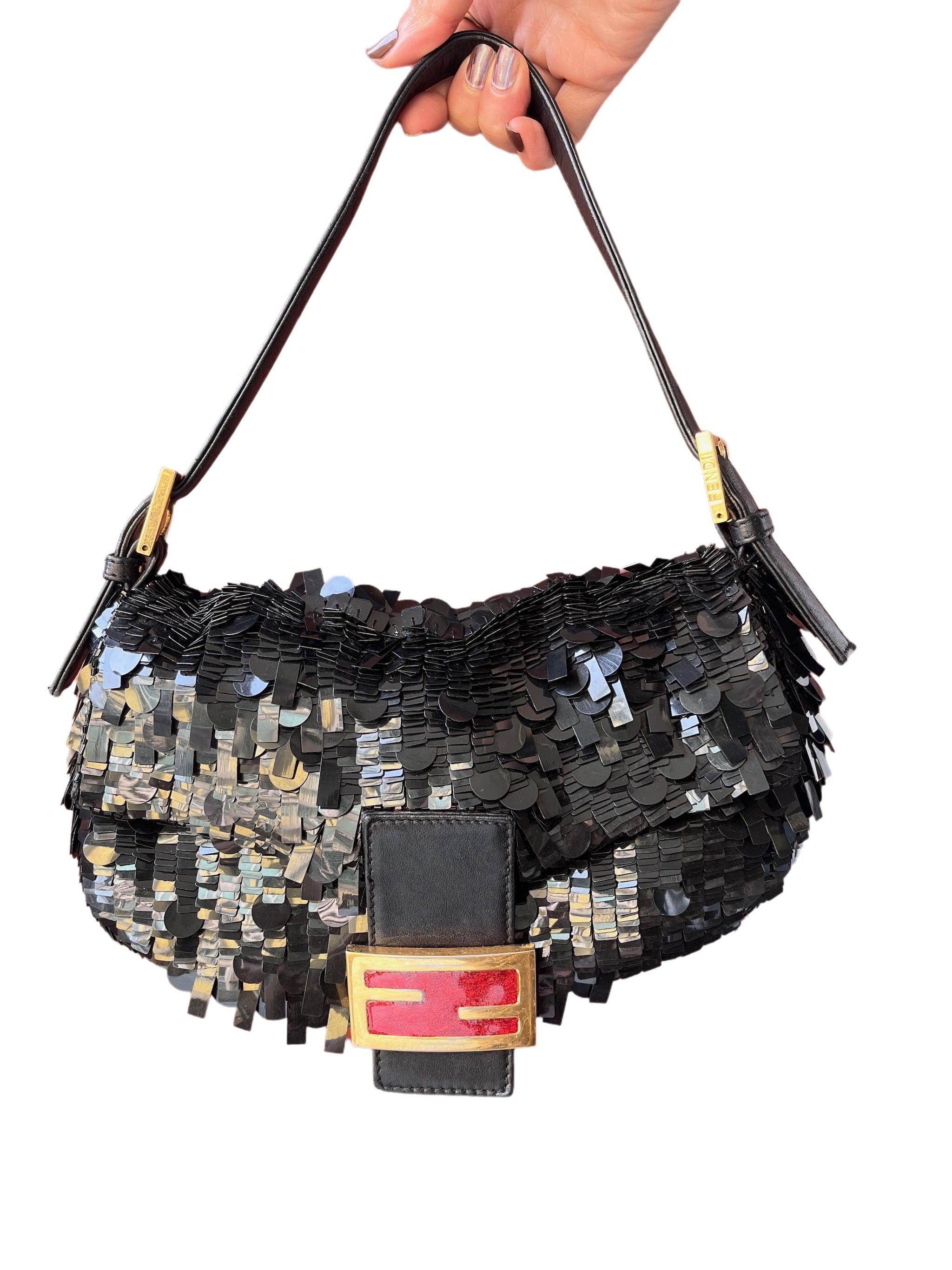 Fendi Baguette Multi-shape Black Sequins with Red Buckle
 These are professional photos of the actual bag offered by Luxbags.
 This Fendi baguette is one of the most sought-after style in the vintage market. It is the exact same style as the famous