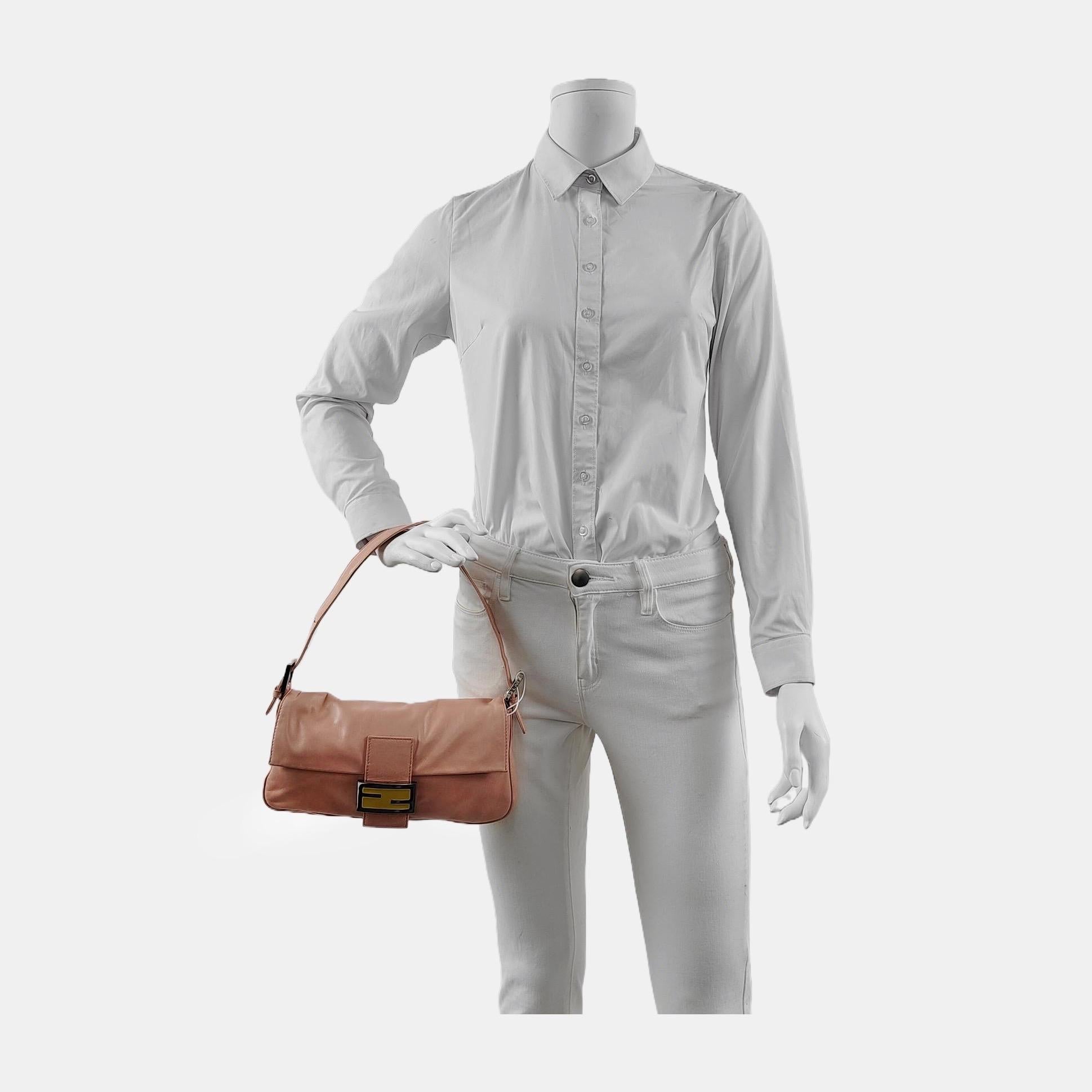 FENDI Baguette Lambskin Leather is a classic, go-to accessory. Its buttery soft leather is incredibly light, making it a functional choice for daily use. 

Condition: VERY GOOD

Minor signs of wear, creases on the leather, small crack and scuffs on