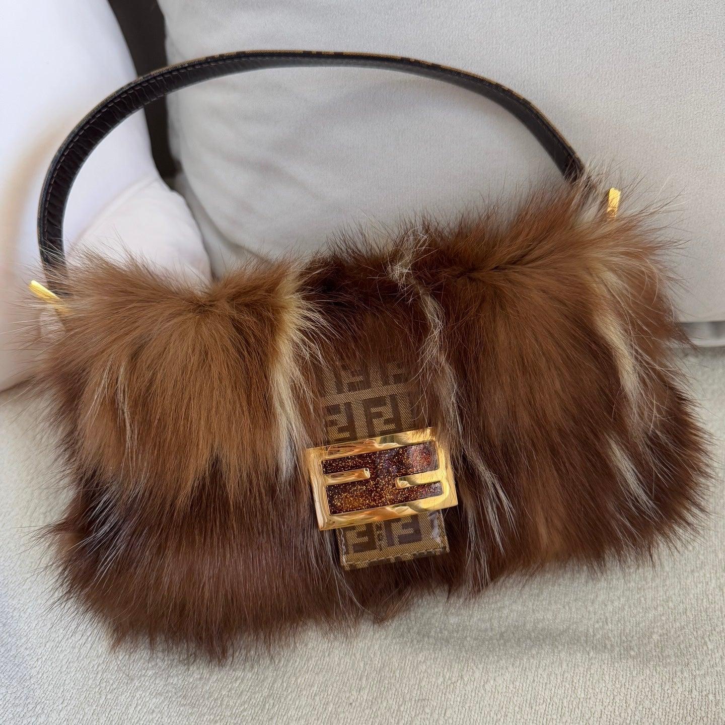 Fendi Baguette RARE Skunk Fur Vinyl Zucchino Strap Tobacco Multicolor
 These are professional photos of the actual bag.
 CONDITION: VERY GOOD
 This vintage Fendi baguette is in very good condition. Scratches to the hardware
 DETAILS
 
 Fendi 
