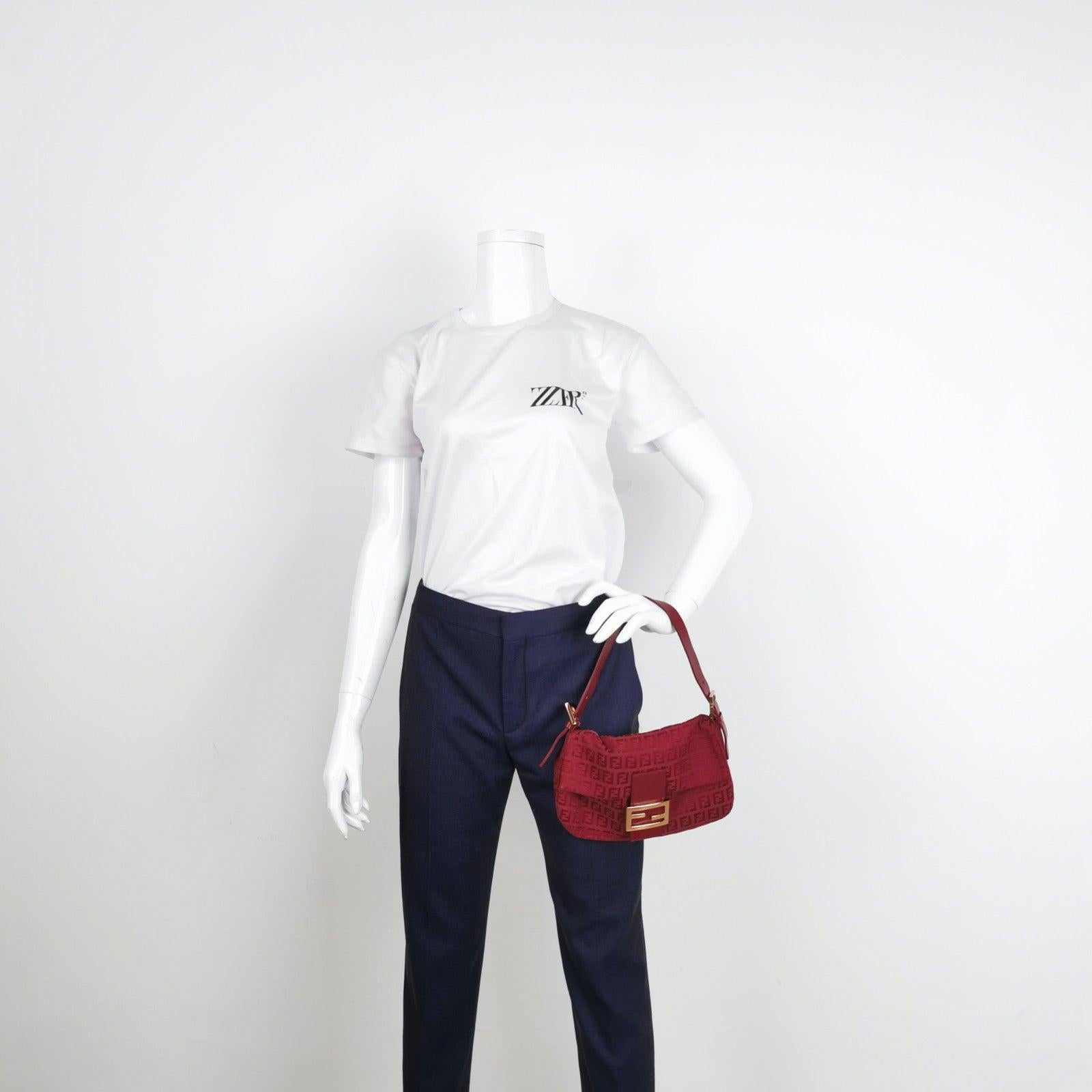 Fendi Baguette Red Zucchino Print Monogram
 These are professional photos of the actual bag offered by Luxbags.
 Model: Fendi Baguette;Size: Medium;Condition: Very good vintage condition;Exterior Material: Canvas;Exterior Color: Red;Strap Material: