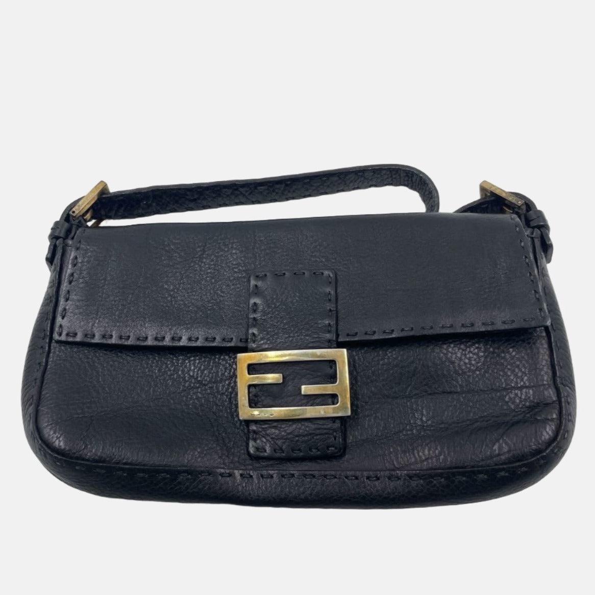 Fendi Baguette Selleria Calfskin Leather Sellier Stitching Redyed Black Shoulder Bag

Introducing the Fendi Baguette, a classic icon featuring the beloved Zucca print. This vintage brown shoulder bag is a must-have for fashion lovers, bringing both
