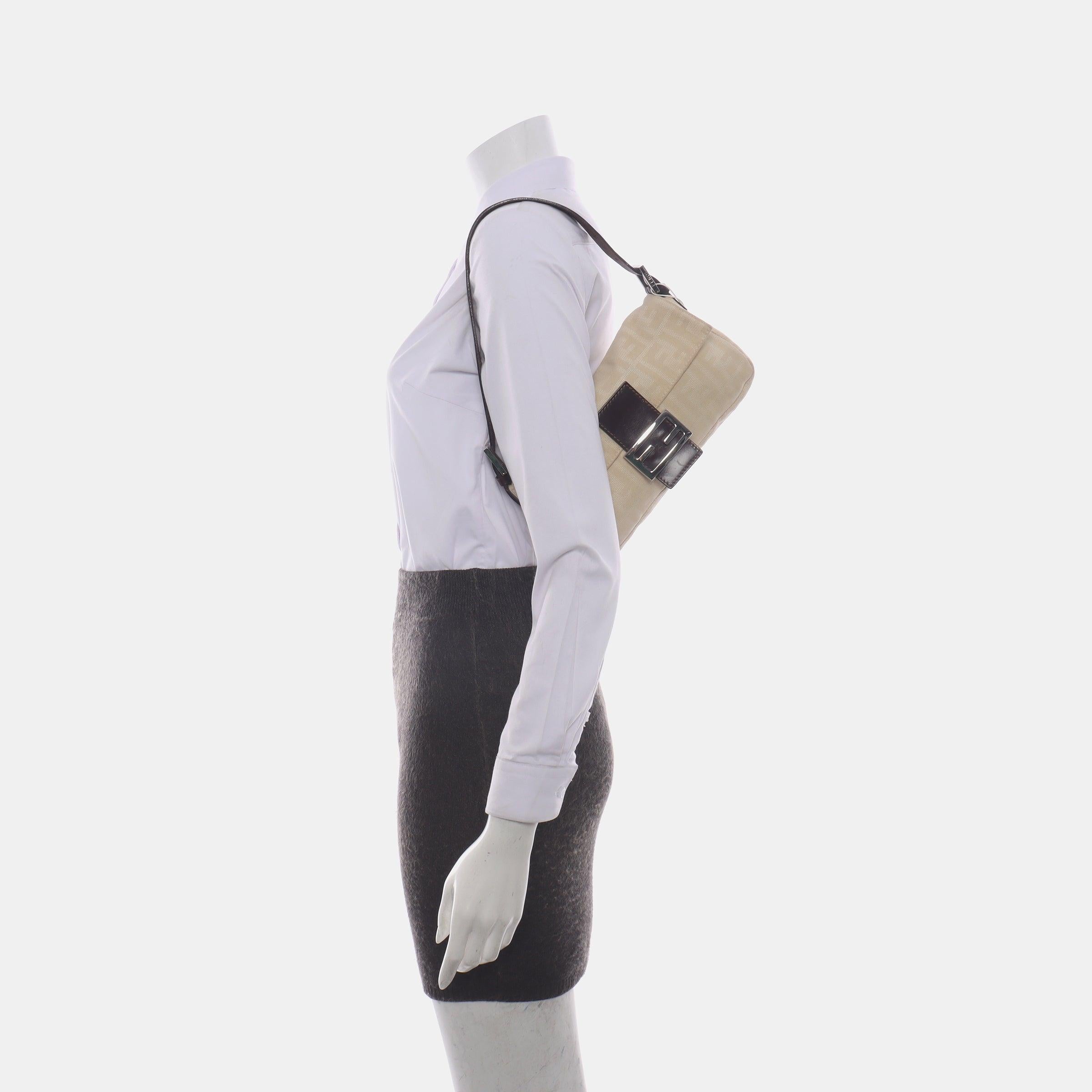 FENDI Baguette Vintage Beige Zucca Print Canvas Shoulder Bag
 These are professional photos of the actual bag.
 Introducing the timelessly elegant FENDI Baguette Black Cloth! In excellent condition, this classic piece is perfect for any occasion
