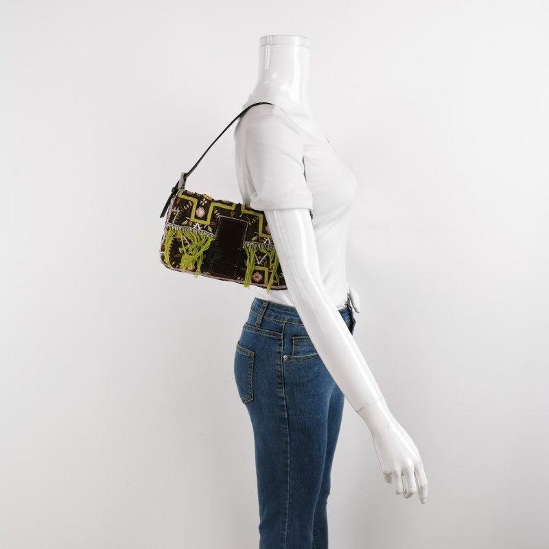 Fendi Baguette Vintage Brown Canvas with embroidery sequins mirrors and tassels

  This rare vintage Fendi Baguette is made of Brown Canvas/cotton material, adored with pink and green embroidery, sequins, mini mirrors and green tassels. 
 