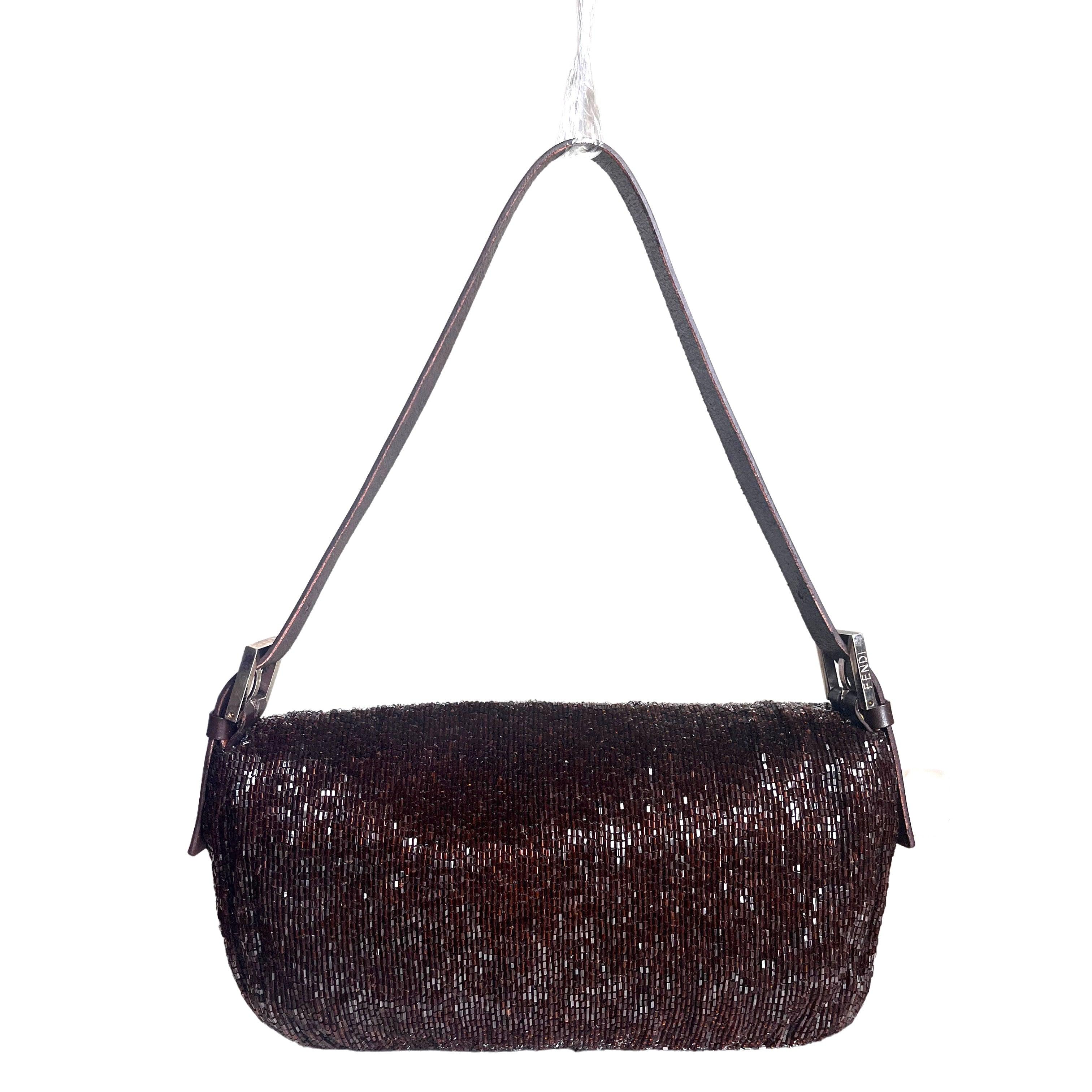 Fendi Baguette Vintage Chocolate Brown Glitter Beads
  These are professional photos of the actual bag.
  Discover the Fendi Baguette Vintage Chocolate Brown Glitter Beads - a masterfully crafted, iconic design enhanced with shimmering beads. This