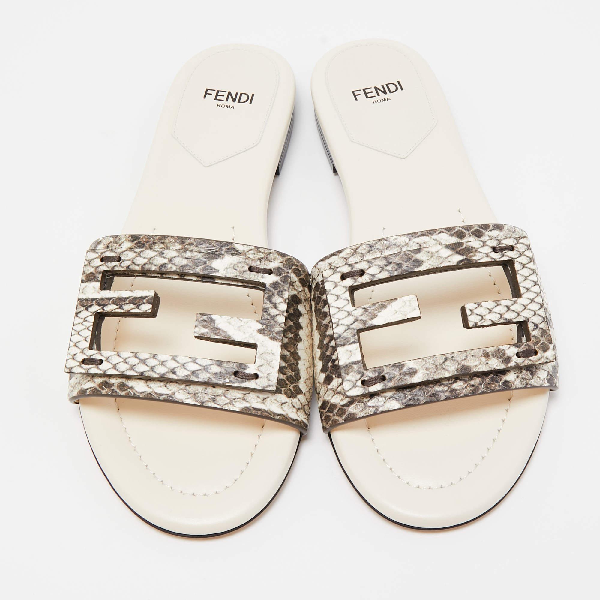 Frame your feet with these Fendi flat slides. Created using the best materials, the flats are perfect with short, midi, and maxi hemlines.

Includes: Original Dustbag, Original Box, Info Booklet