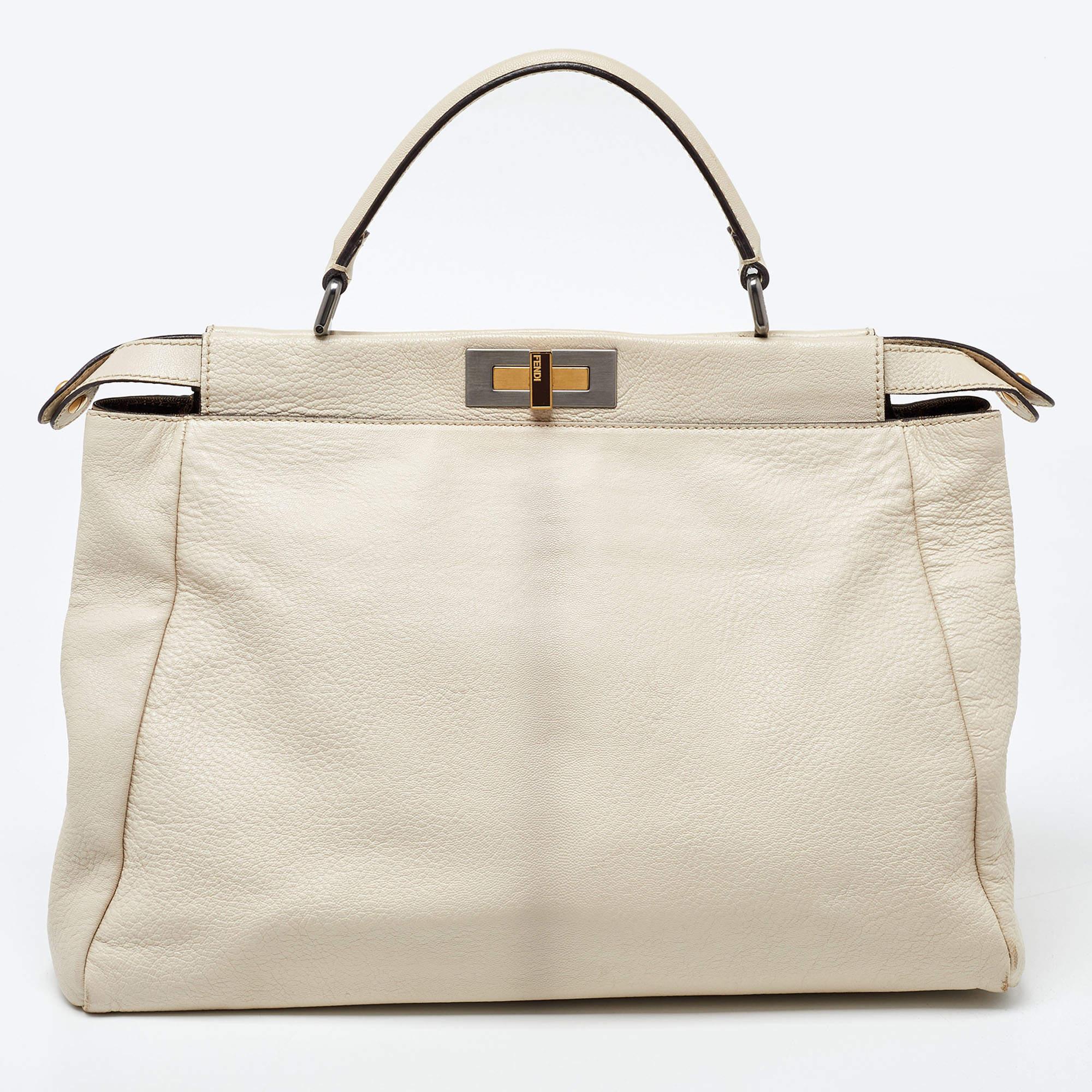 Designer bags are ideal companions for ample occasions! Here we have a fashion-meets-functionality piece crafted with precision. It has been equipped with a well-sized interior that can easily fit all your essentials.

Includes: Info Booklet,