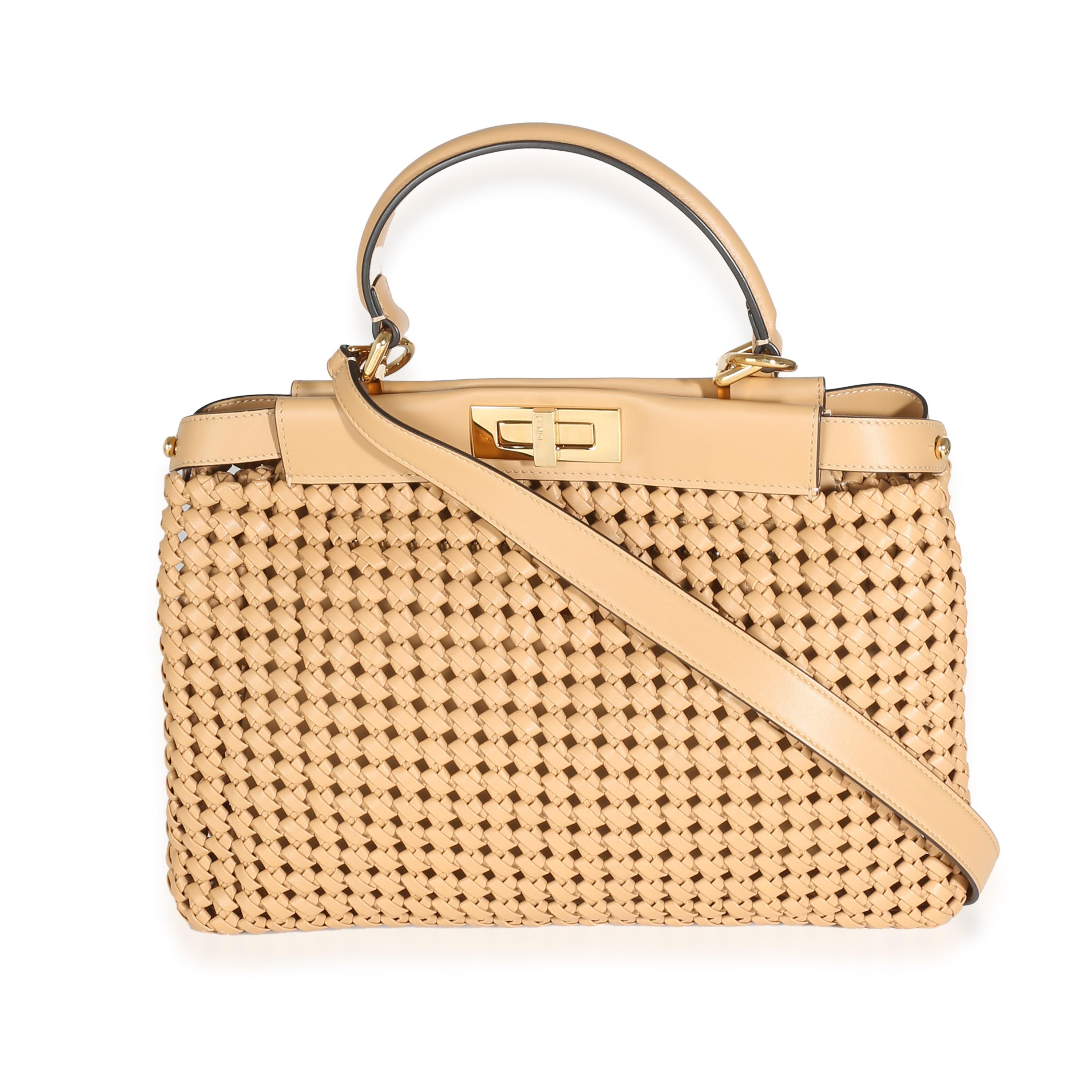 Listing Title: Fendi Beige Nappa Matisse Intreccio Medium Peekaboo Iconic Satchel
SKU: 142300
Condition: Pre-owned 
Condition Description: Fendi's answer to put-together style is the Peekaboo IseeYou tote bag, which offers a structured silhouette.