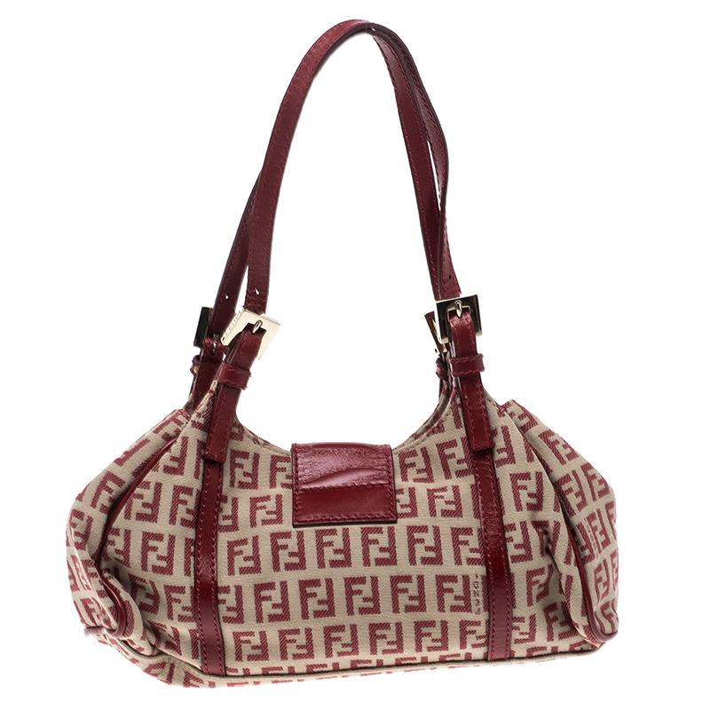 With a fabric lining and a Zucchino canvas exterior, this bag is all sleek and ready to be yours. Coming from Fendi, this will showcase your fashion-forward choice. Fashionably finished, this satchel will assist you with ease.

Includes: Original