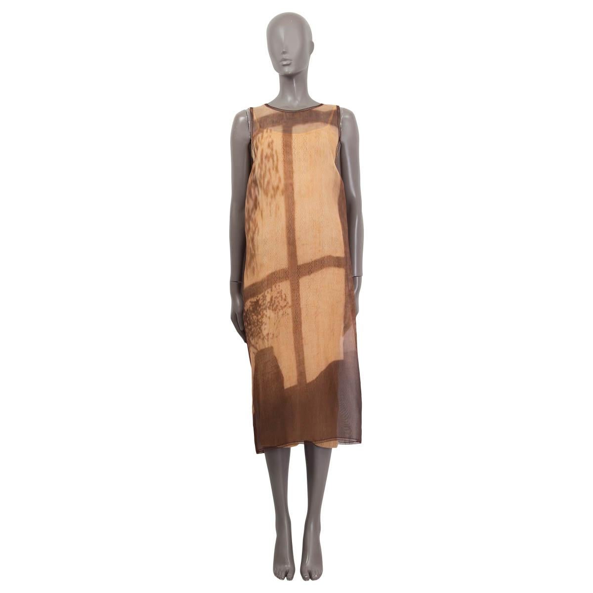 100% authentic Fendi Spring/Summer 2021 sleeveless sheer woven silk mid-length dress in beige and brown silk (assumed cause tag is missing). Features printed graphic in tones of brown and beige and has a modified wrap construction. Has an