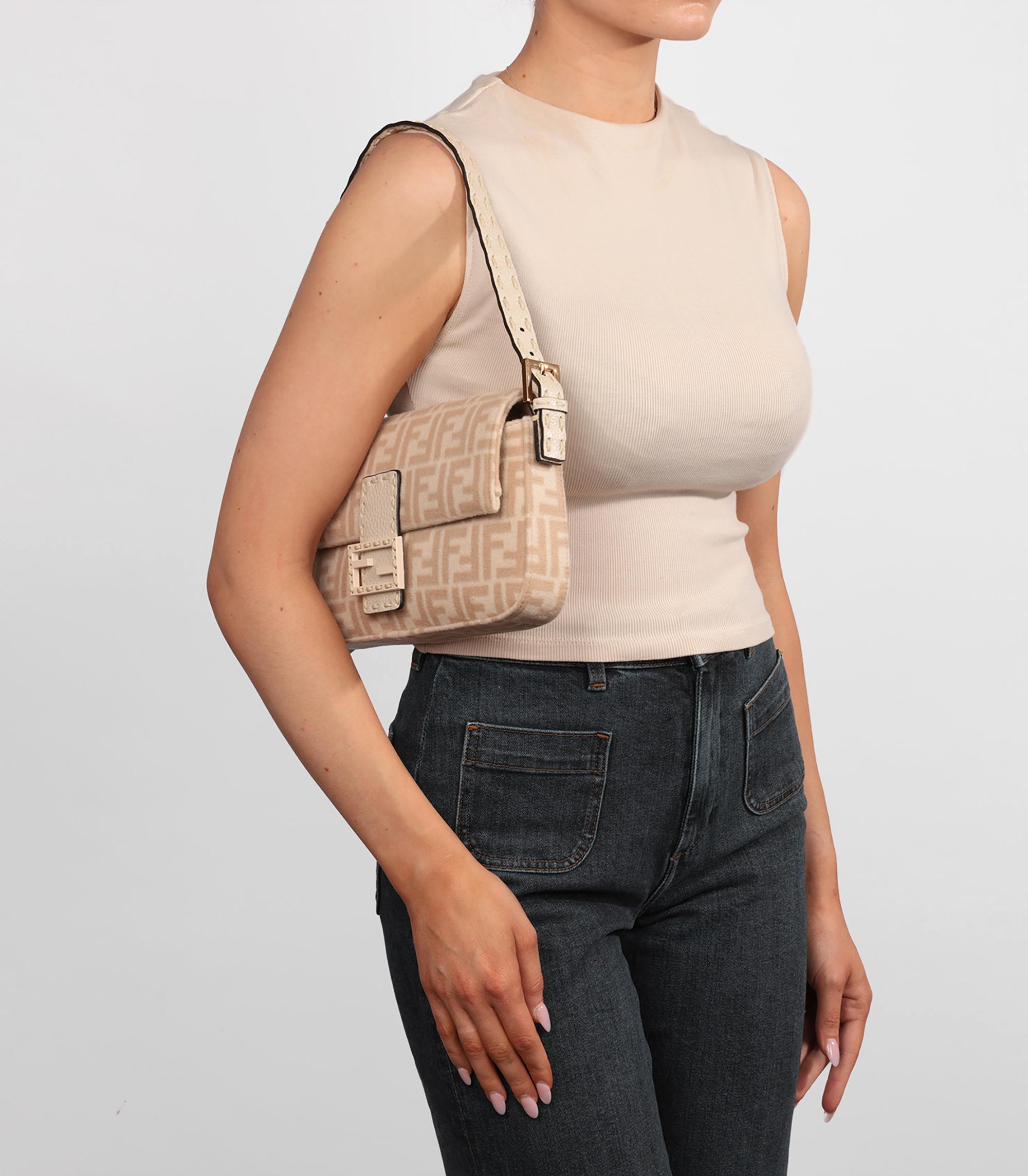 Fendi Beige Wool & Cream Calfskin Leather Baguette Shoulder Bag

Product Details
Xupes Ref: CB1462
Brand: Fendi
Model: Baguette
Type: Shoulder
Serial Number: 8BR792.AH9E.2190501
Age: 2023
RRP: £2,350
Accompanied By: Fendi Dust Bag, Tags, Care