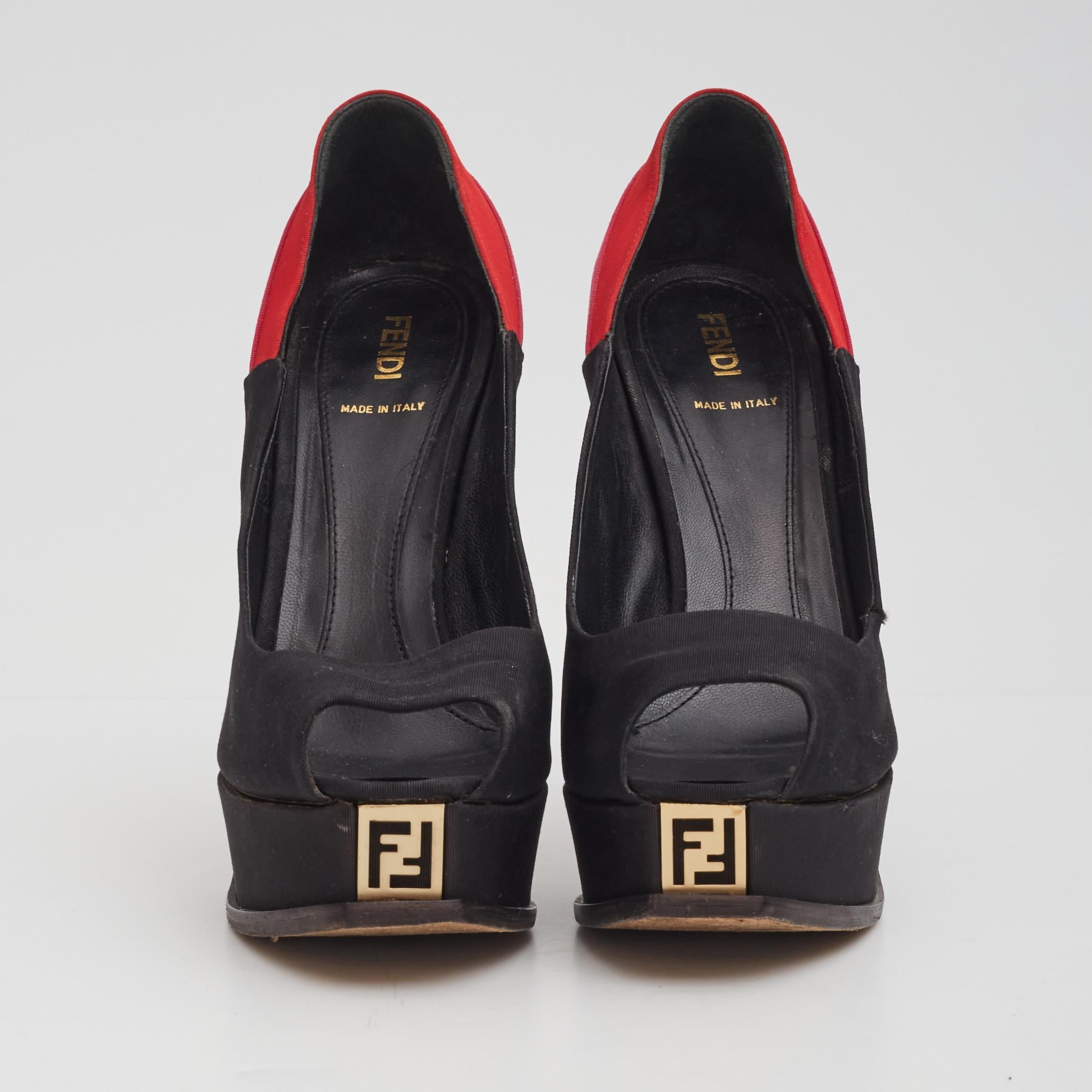 Color: Black with red heel
Material: Cloth
Size: 39 EU / 8 US
Heel Height: 140 mm / 5.5”
Platform Height: 25 mm / 1” 
Condition: Good. Wear includes scuffs, scrapes and stains to the outsoles. Scratches, scuffs, and marks to uppers.

Made In Italy