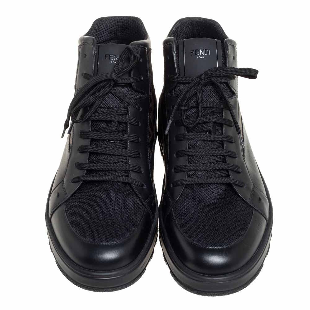 These Fendi sneakers are a reflection of the label's immaculate artistry in shoemaking. Crafted from Zucca canvas, leather, and mesh, they are made into a high-top style. These sneakers are finished off with round toes, laces, and sturdy soles.

