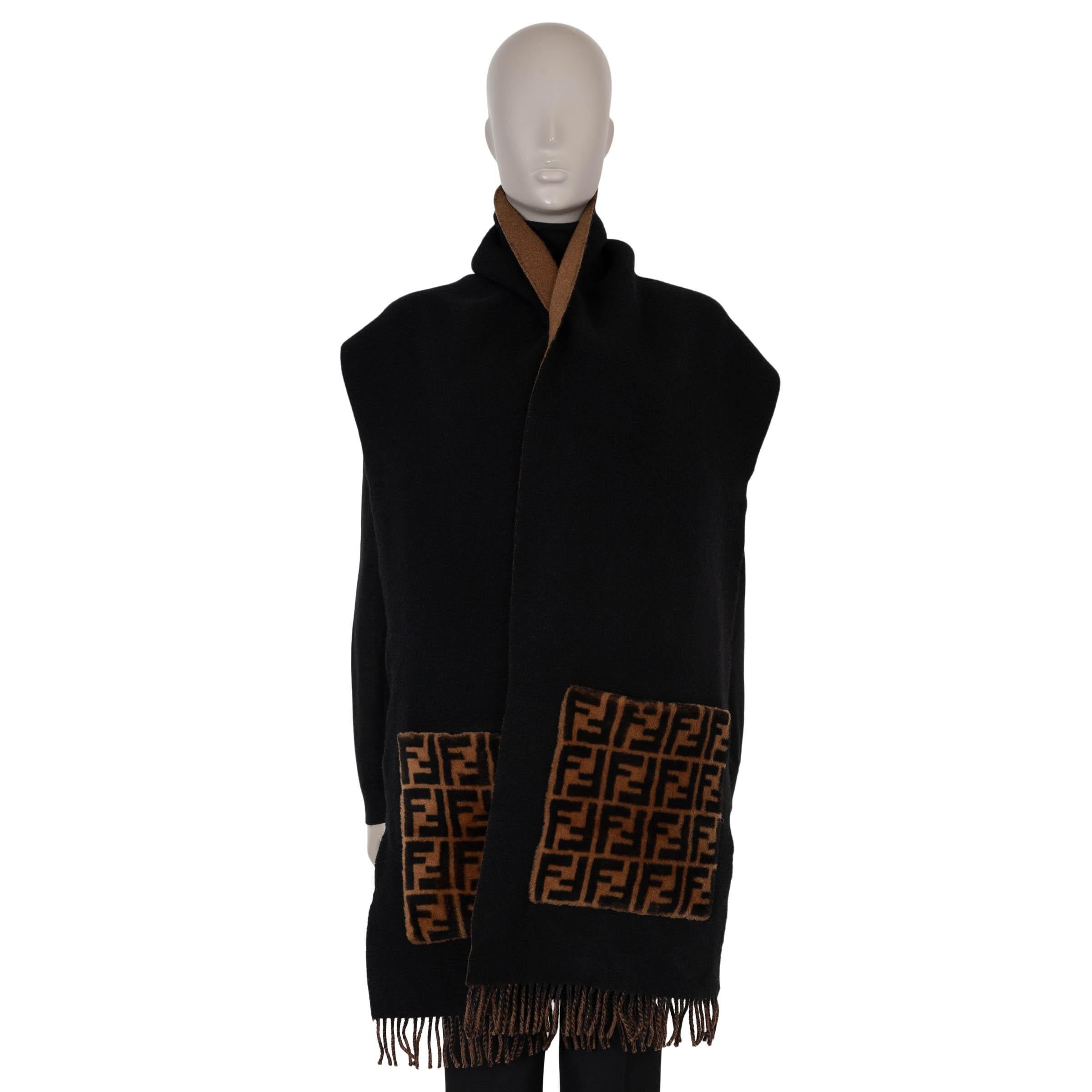 100% authentic This 100% authentic Fendi Touch of Fur muffler scarf in black wool (55%) and cashmere (45%) is a luxurious cold-weather essential. Featuring plush shearling appliqués with a macro FF print, it adds a statement touch to any look.