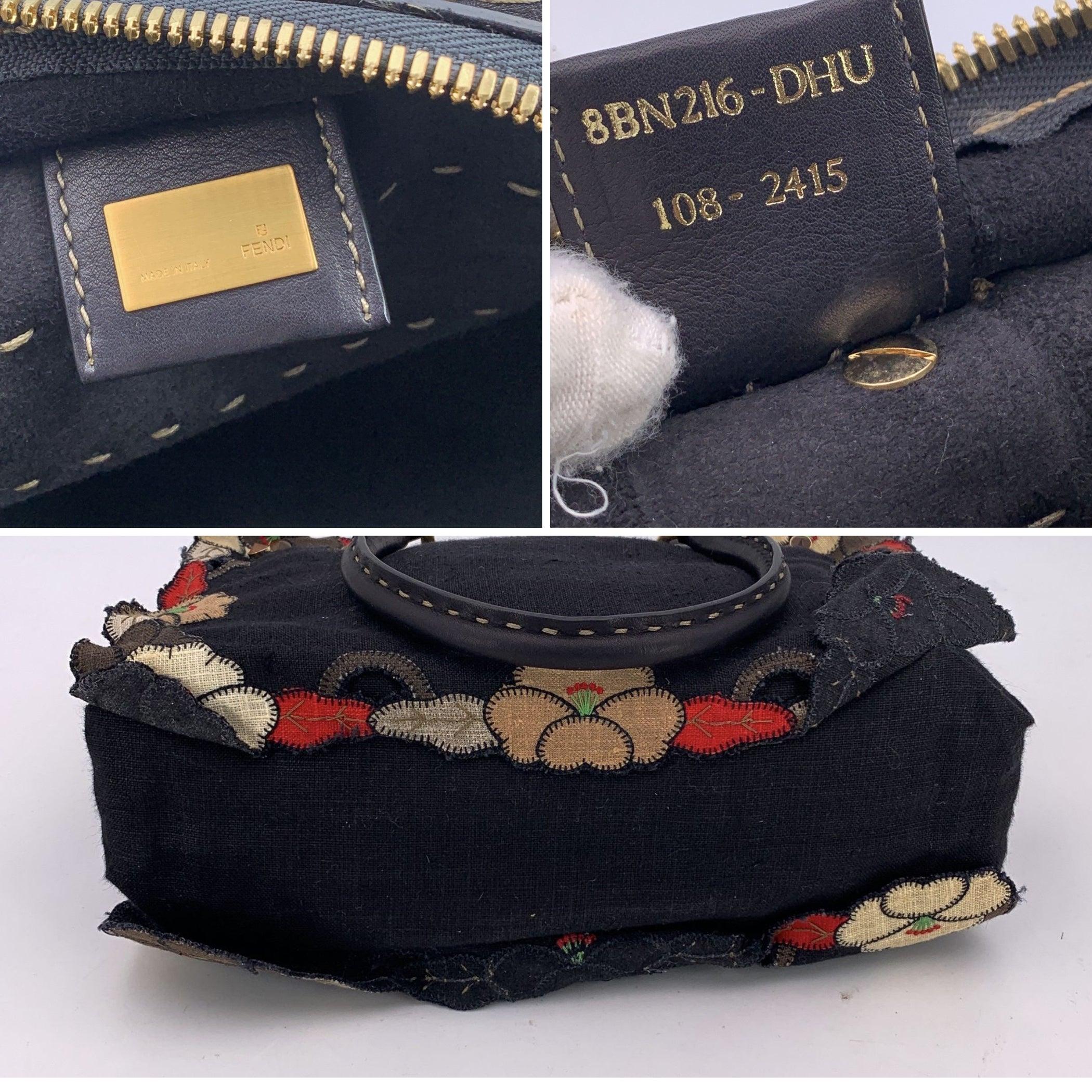 Fendi, borsa a cartella in tela e pelle nera con applicazioni floreali in vendita 1