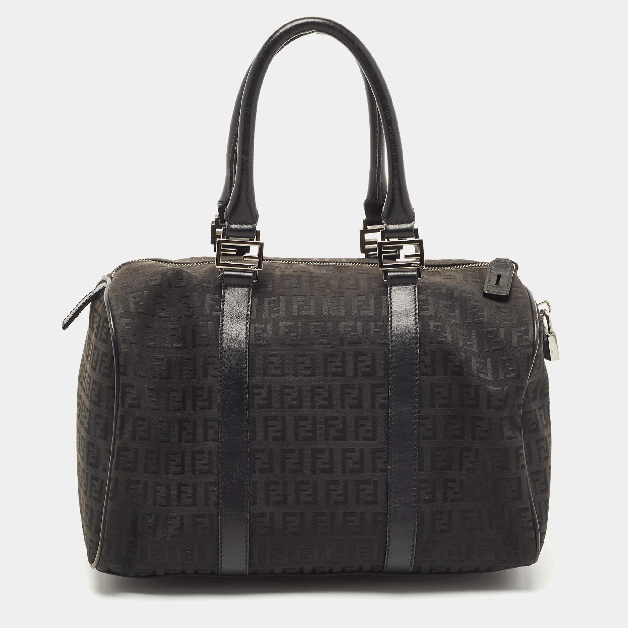 This Boston bag is an ergonomic creation that doesn't let you compromise on style. It not only looks timeless but also comes with a sleek and spacious interior to hold your everyday essentials. A wonderful piece that can accentuate your